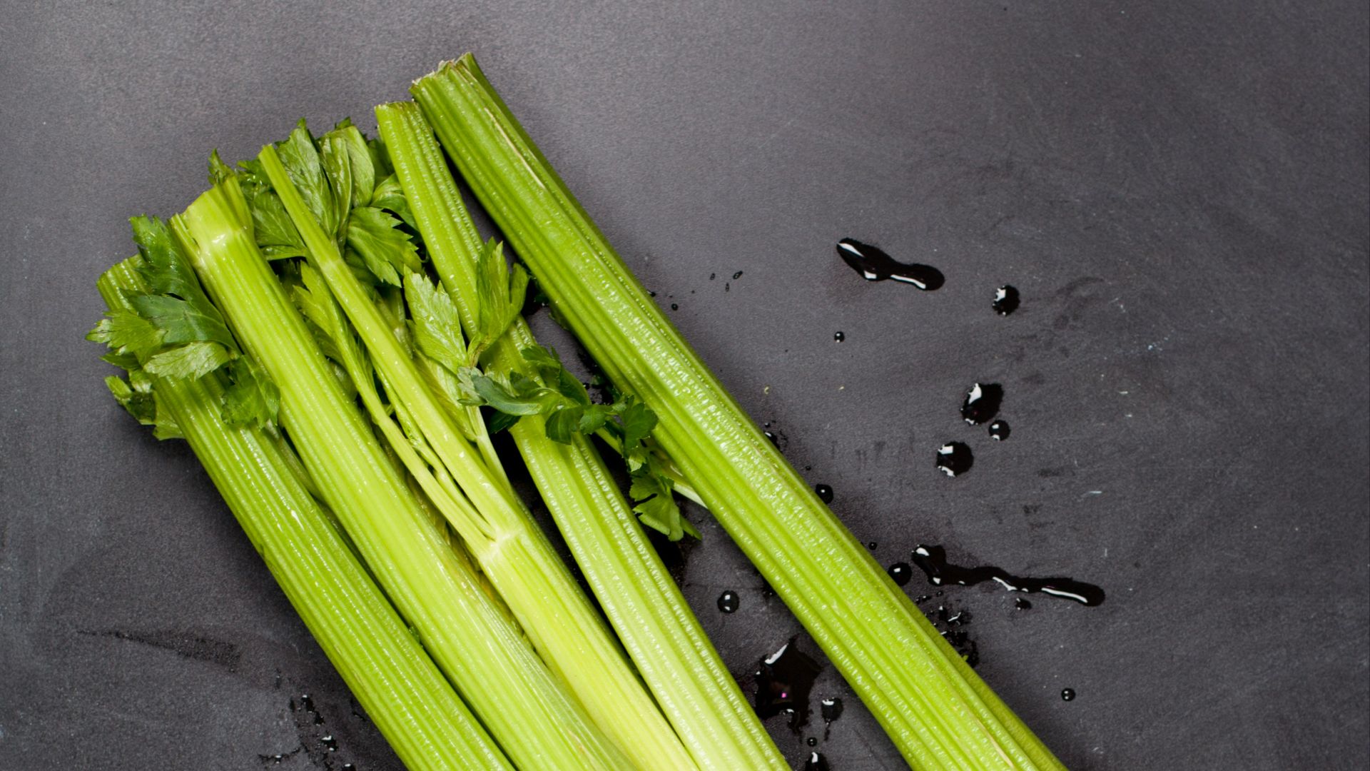 A bunch of celery sitting on top of a table