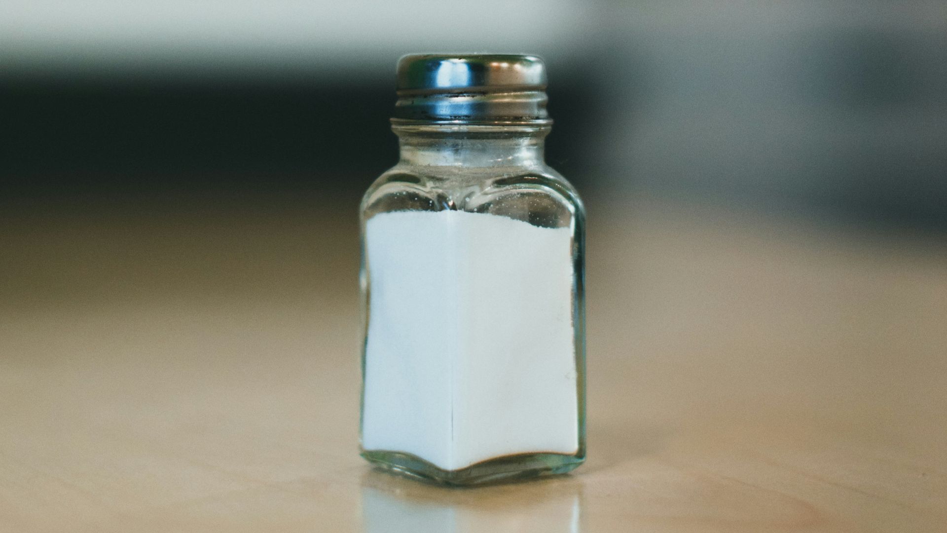 a glass jar with a clear lid