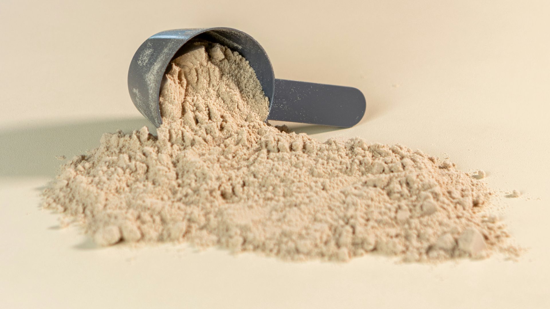 a scoop of powder sitting on top of a table