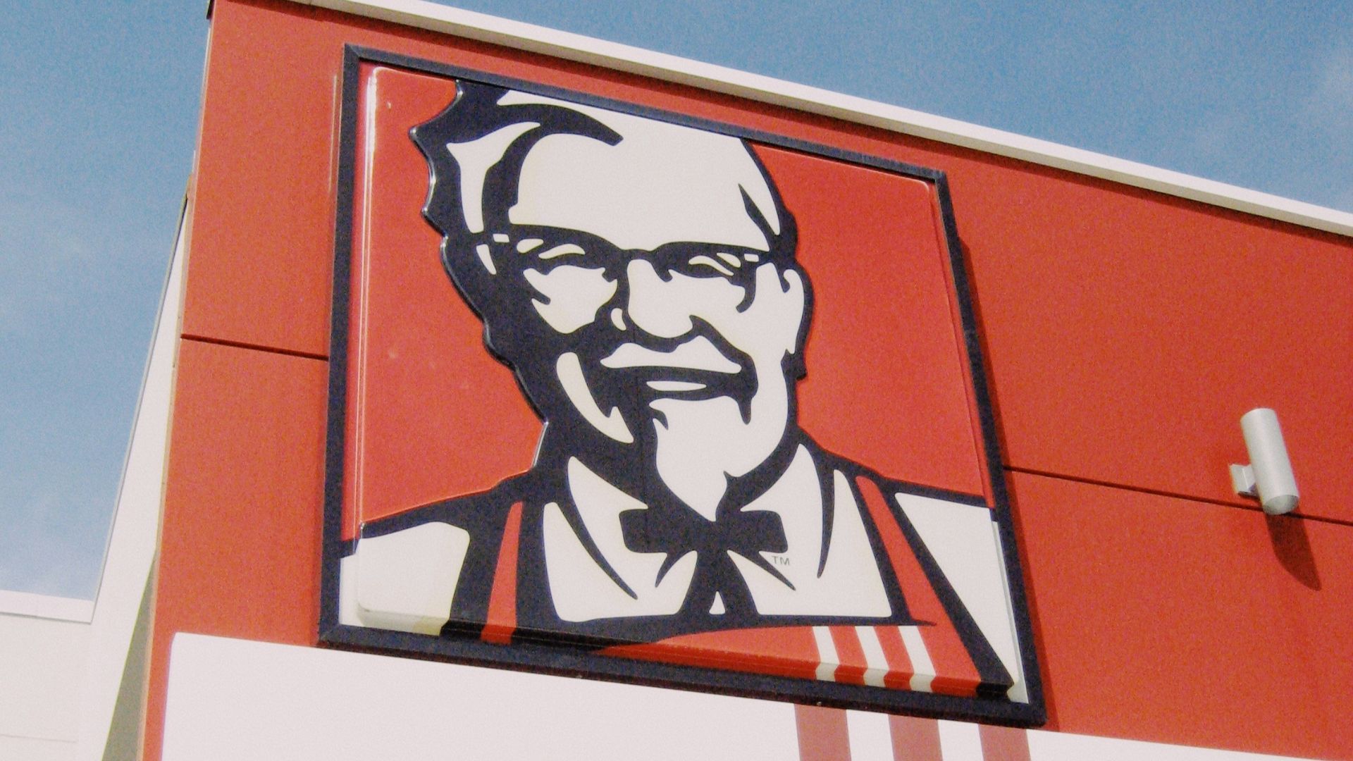 a picture of a man on the side of a building