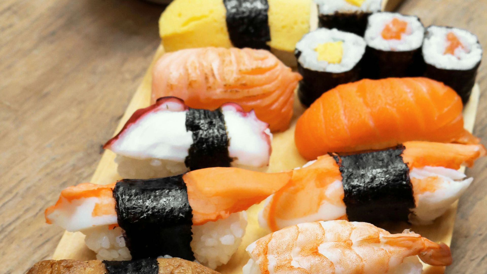 sushi on wooden platter