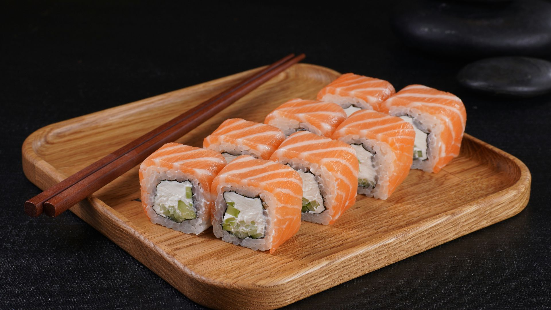 sushi on a wooden cutting board