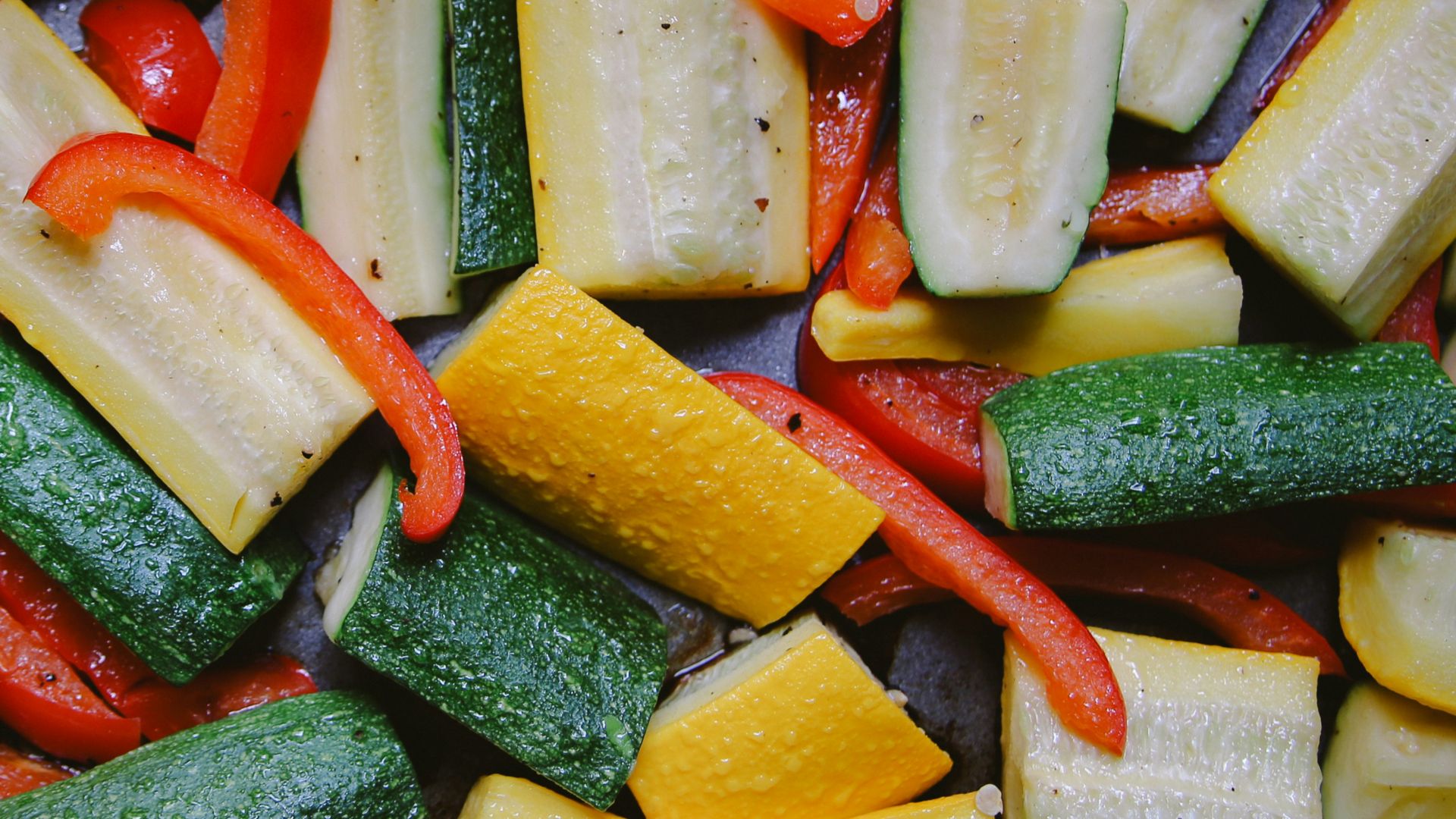 a pile of sliced up vegetables sitting on top of a table