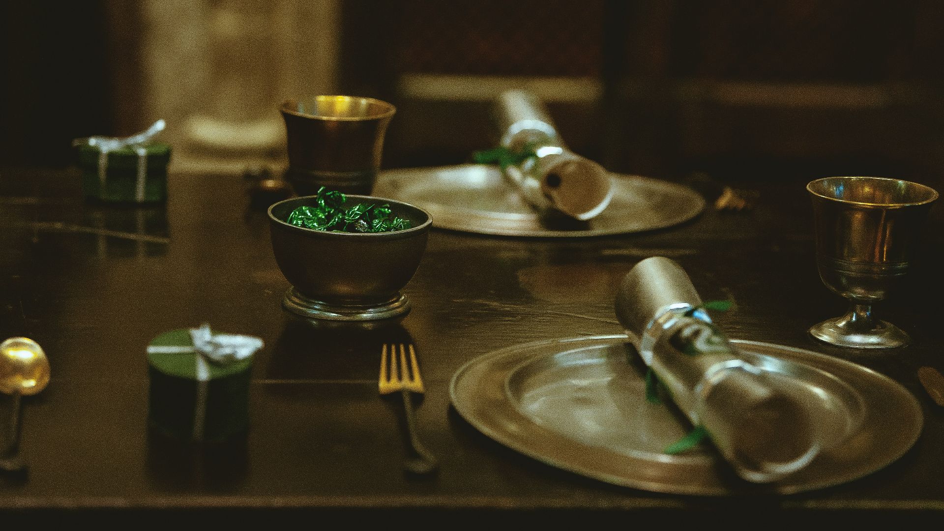 clear drinking glass on stainless steel round tray