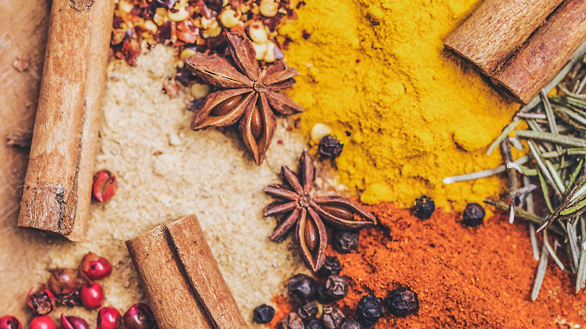 brown wooden chopping board with black beans and brown dried leaves