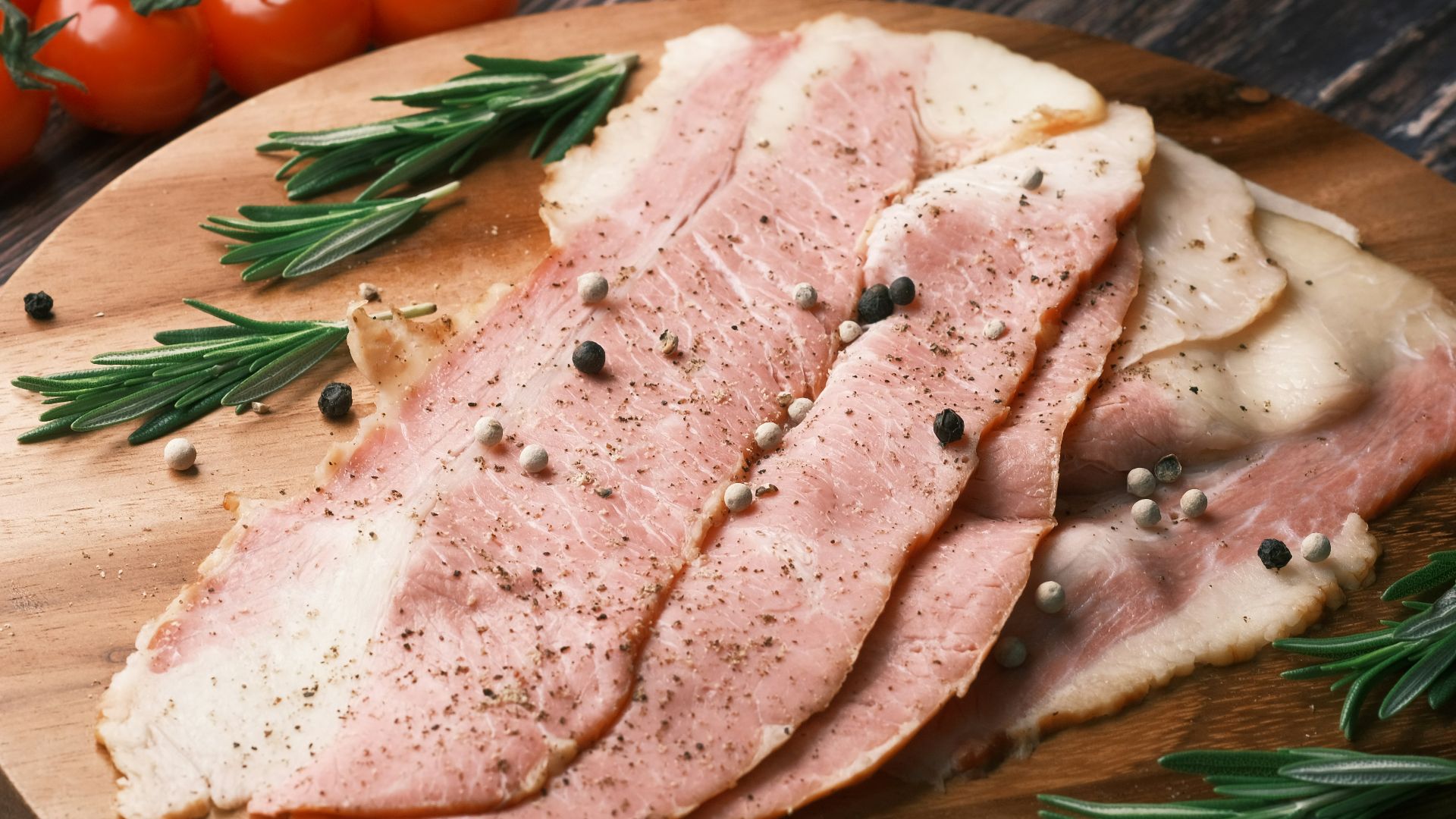 raw meat on brown wooden chopping board