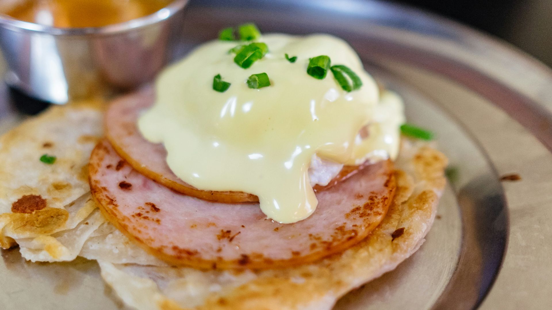 melted cheese on top of cooked ham