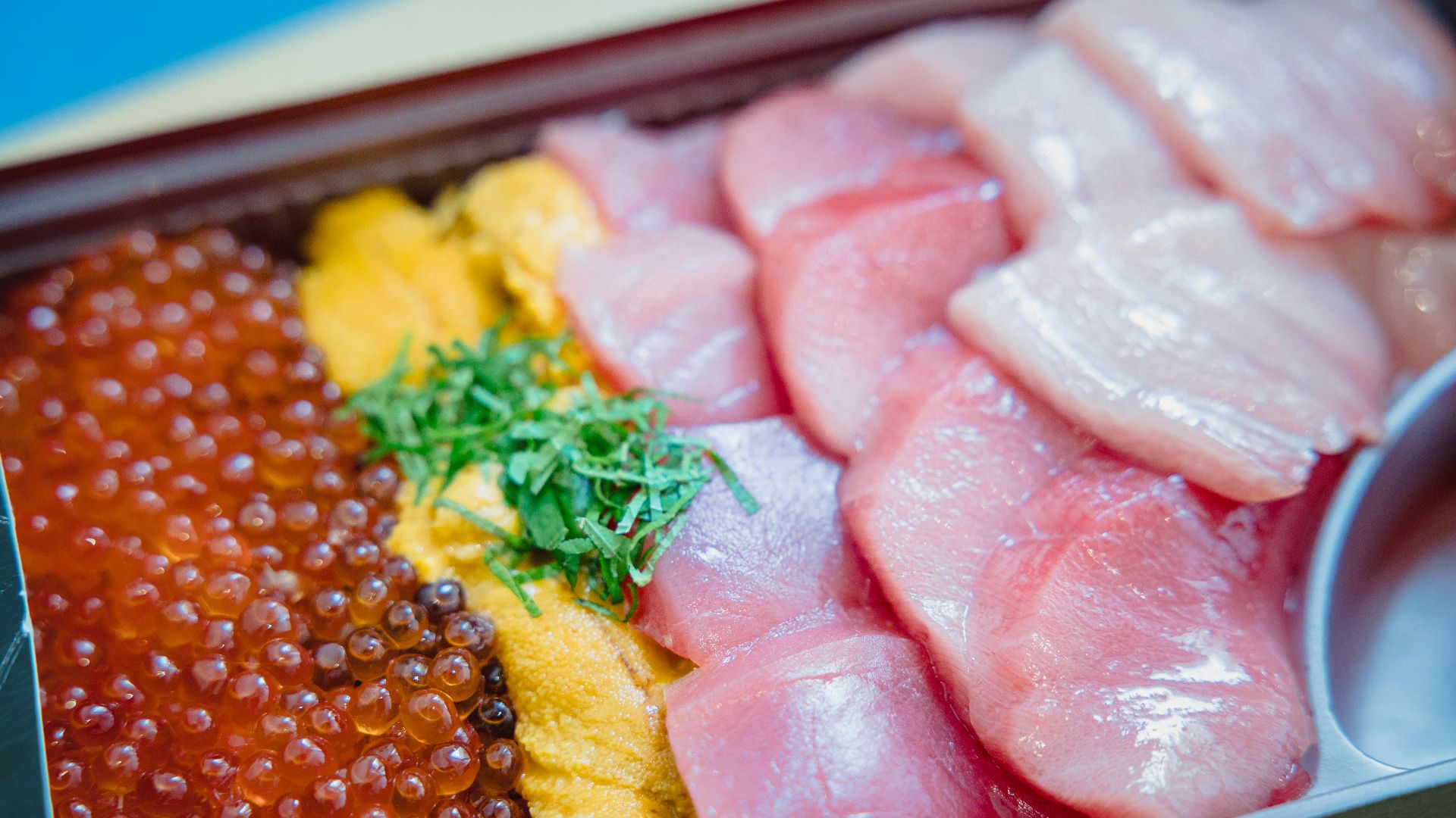 sliced meat on stainless steel tray