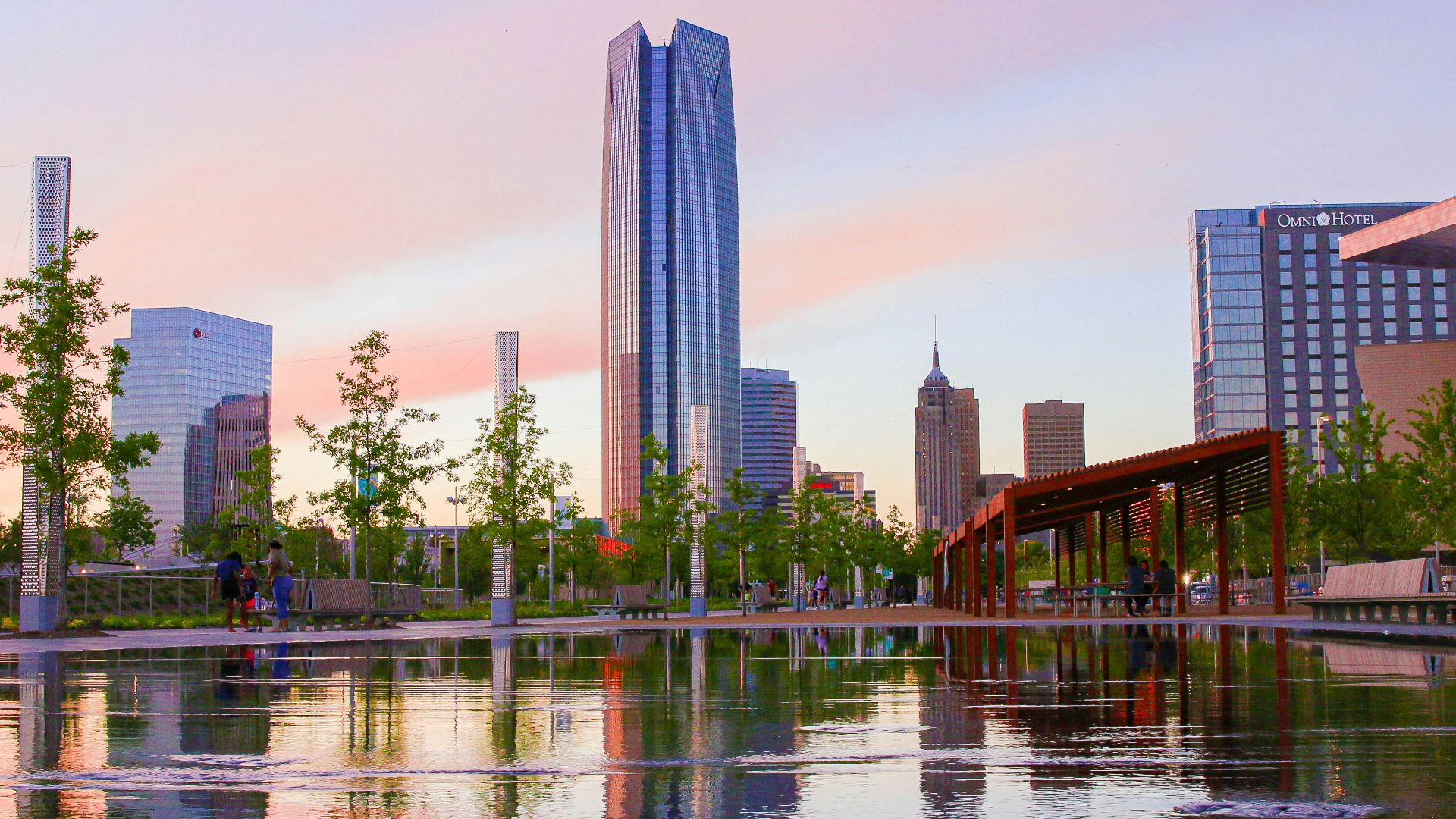 body of water near high rise buildings during daytime