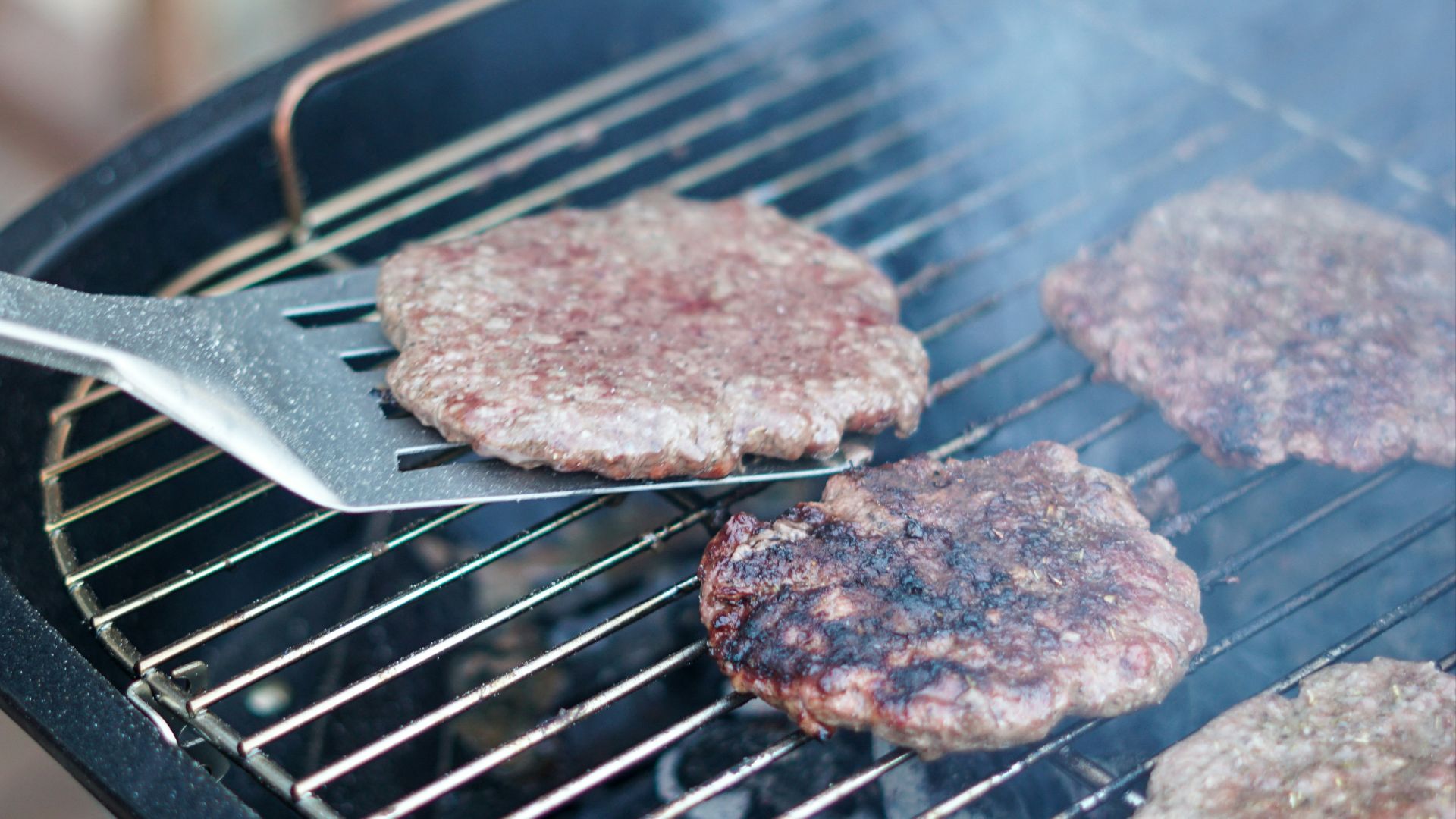 brown meat on black grill