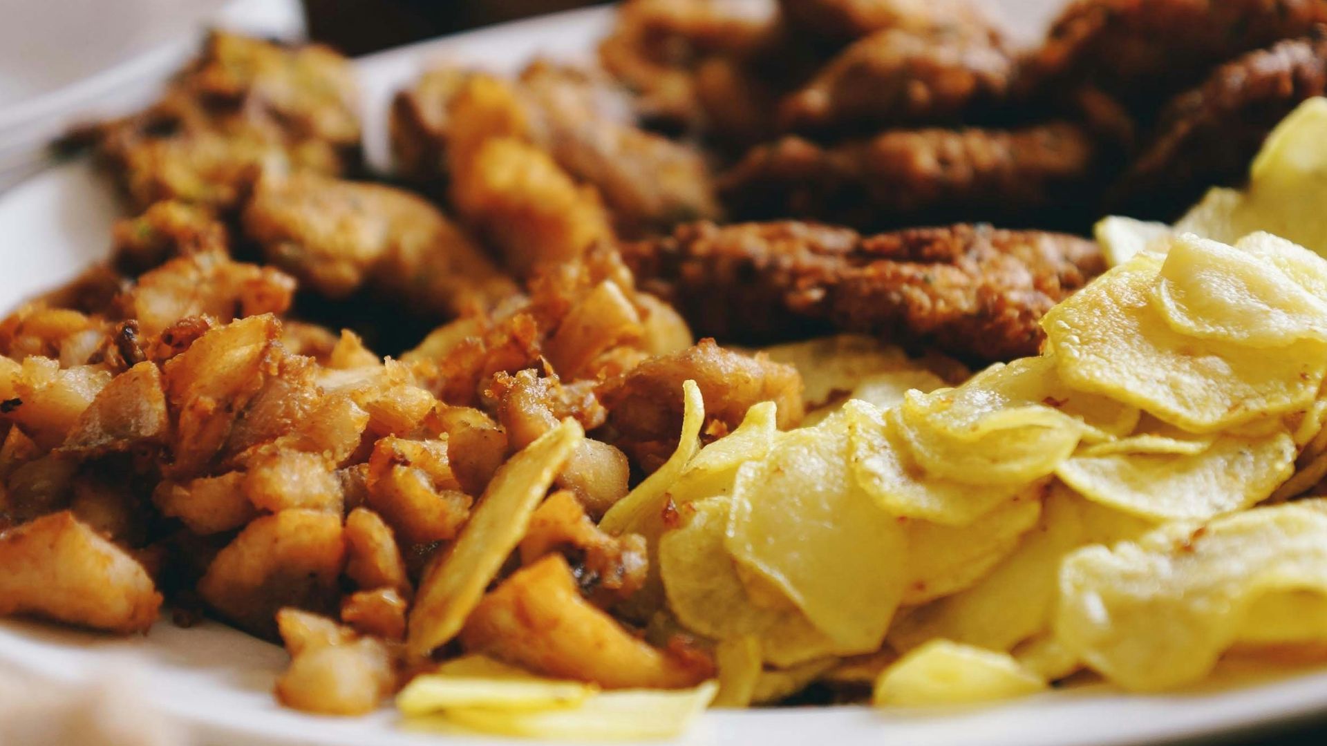a white plate topped with lots of different types of food