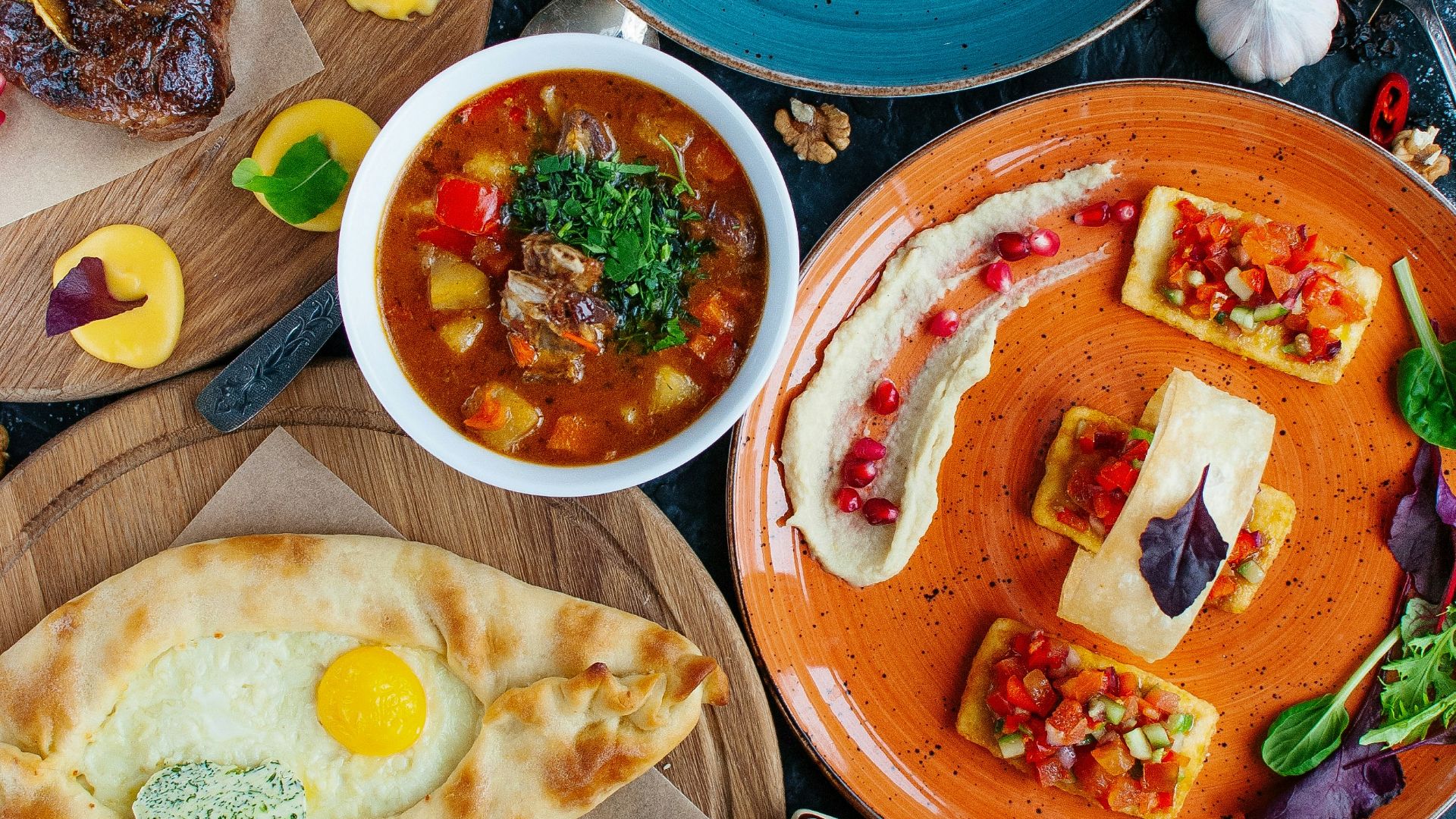 assorted pies and tarts on plates