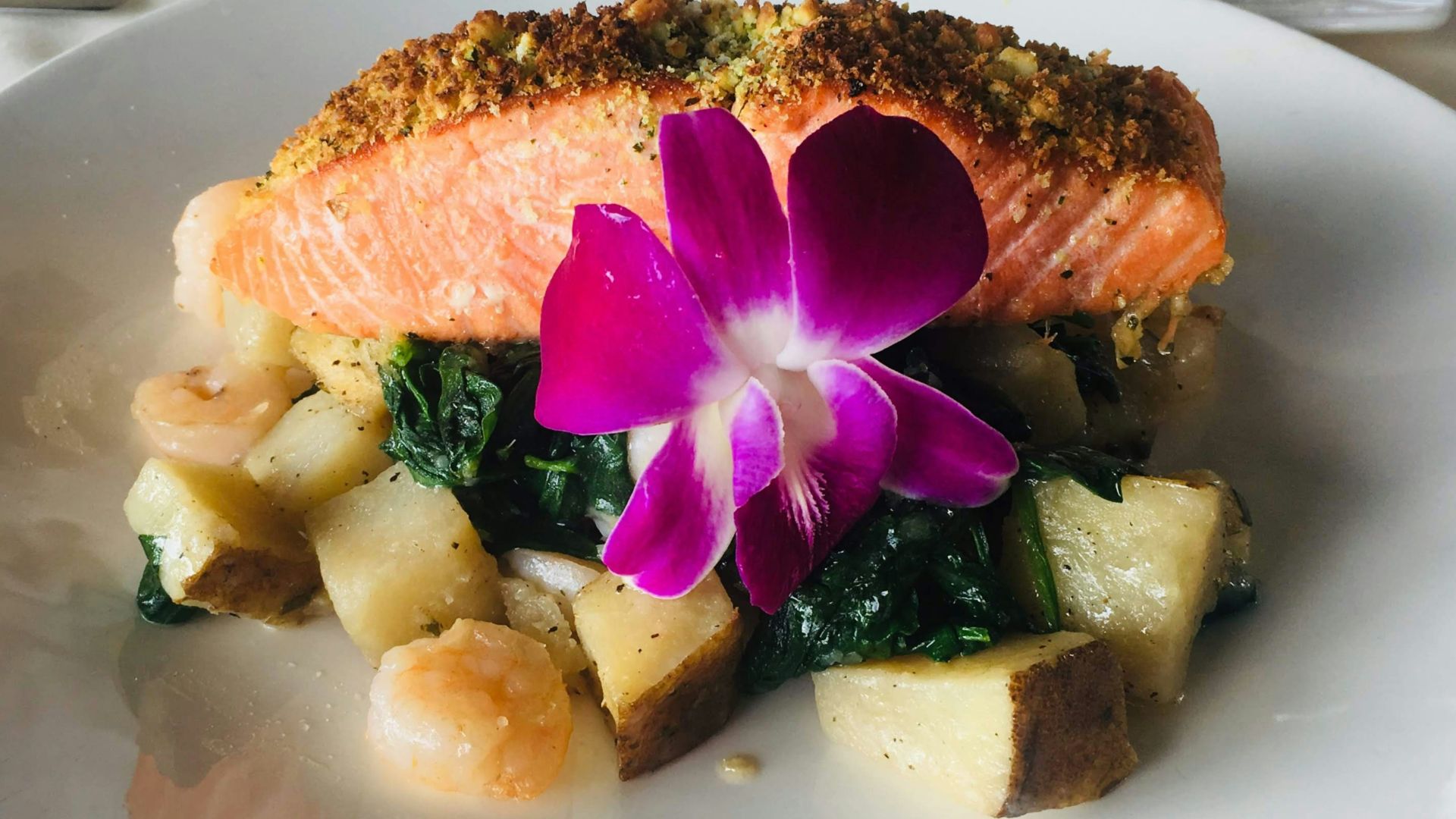 sliced bread with sliced vegetables on white ceramic plate