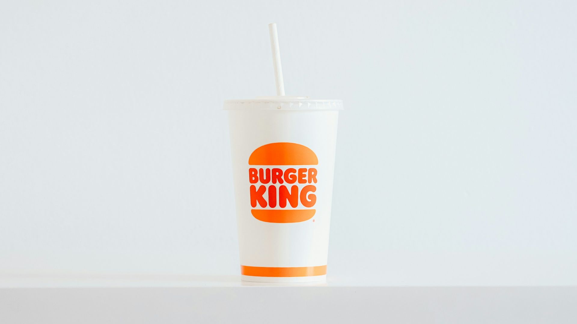 A cup with a straw sticking out of it