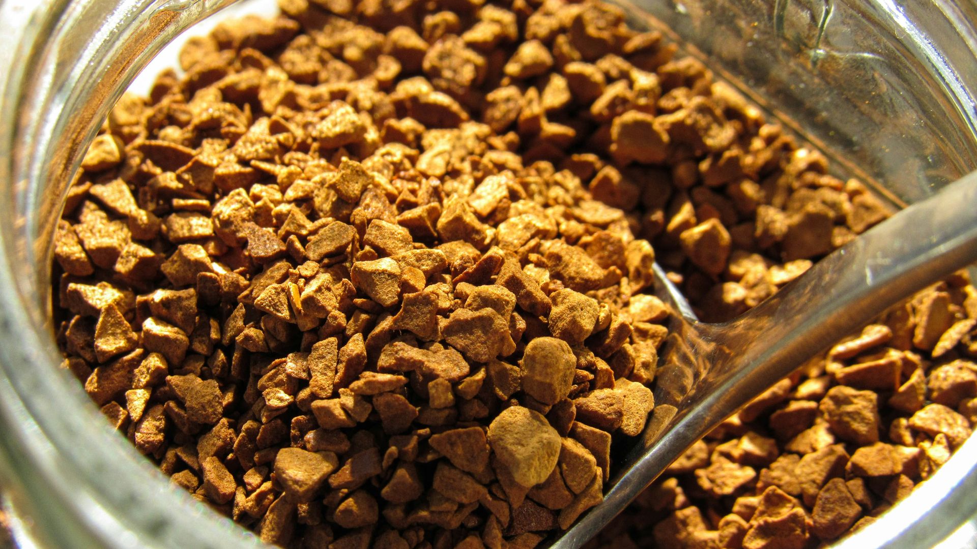 a close up of a glass jar filled with food
