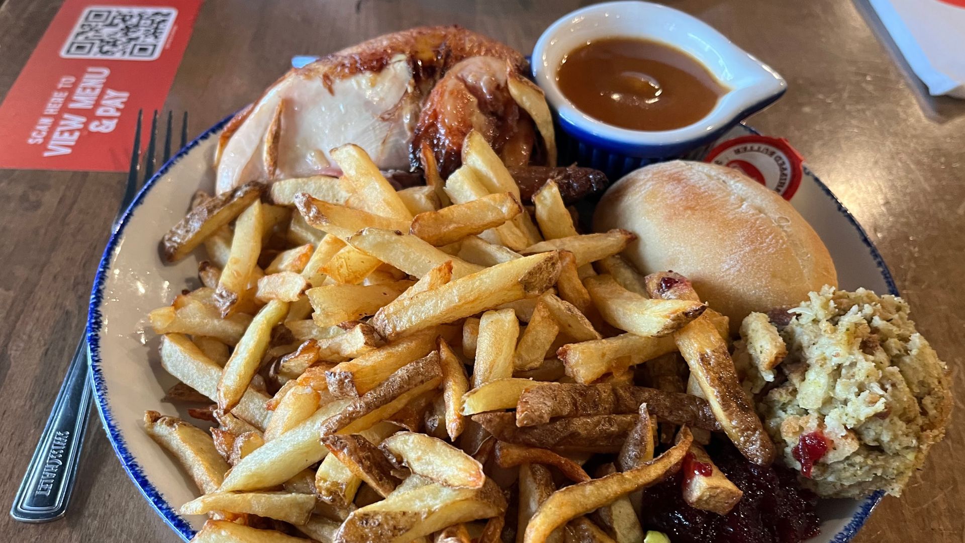 File:Swiss Chalet Festive Meal - Quarter Chicken, French Fries, Dinner Roll, Butter, Cranberry Sauce, Stuffing, Dipping Sauce - December 2022.jpg