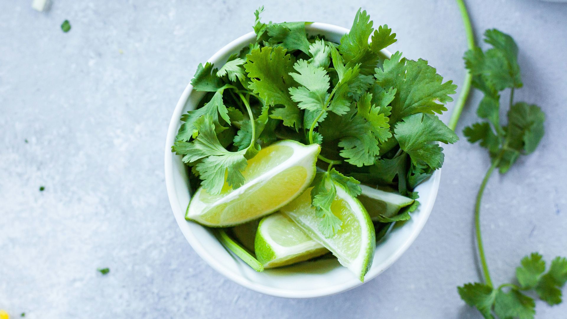 sliced lime in white ceramic bowl