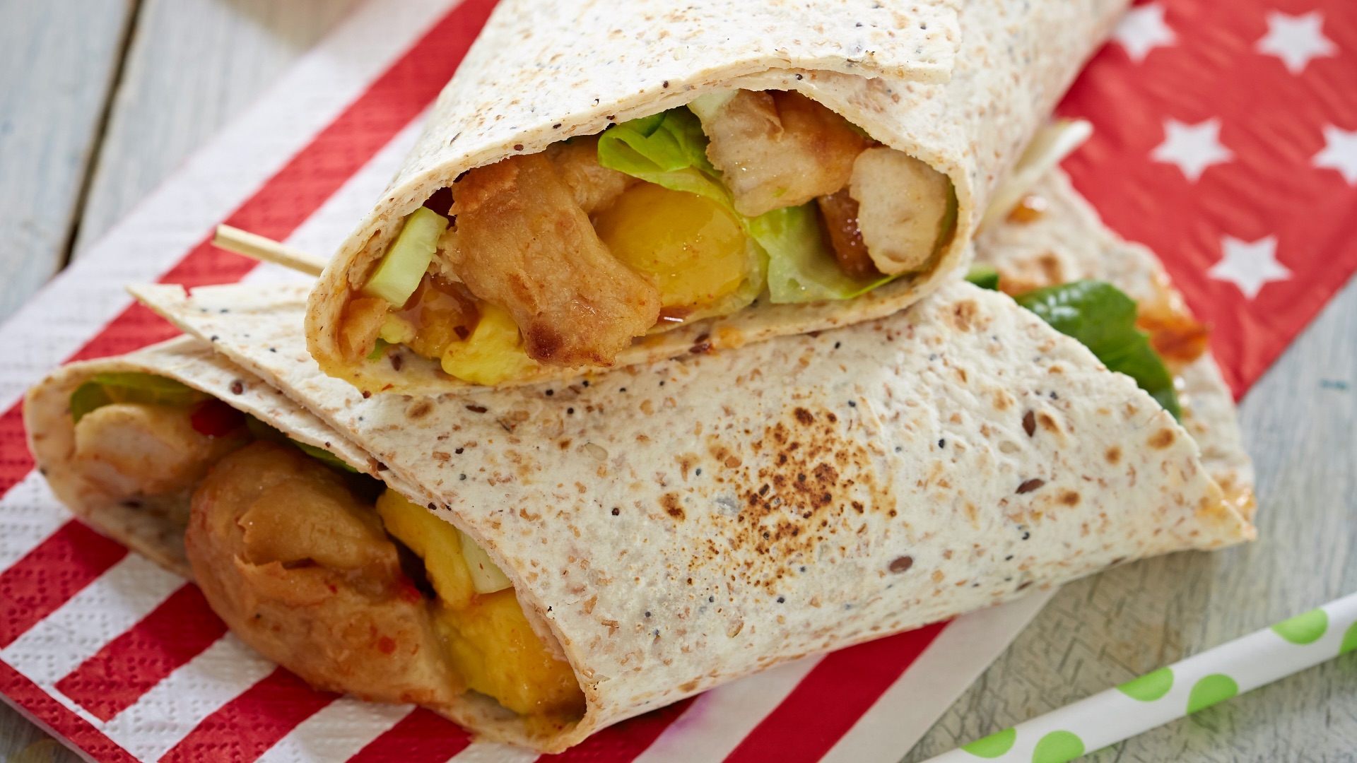 white and brown bread on white and blue floral textile