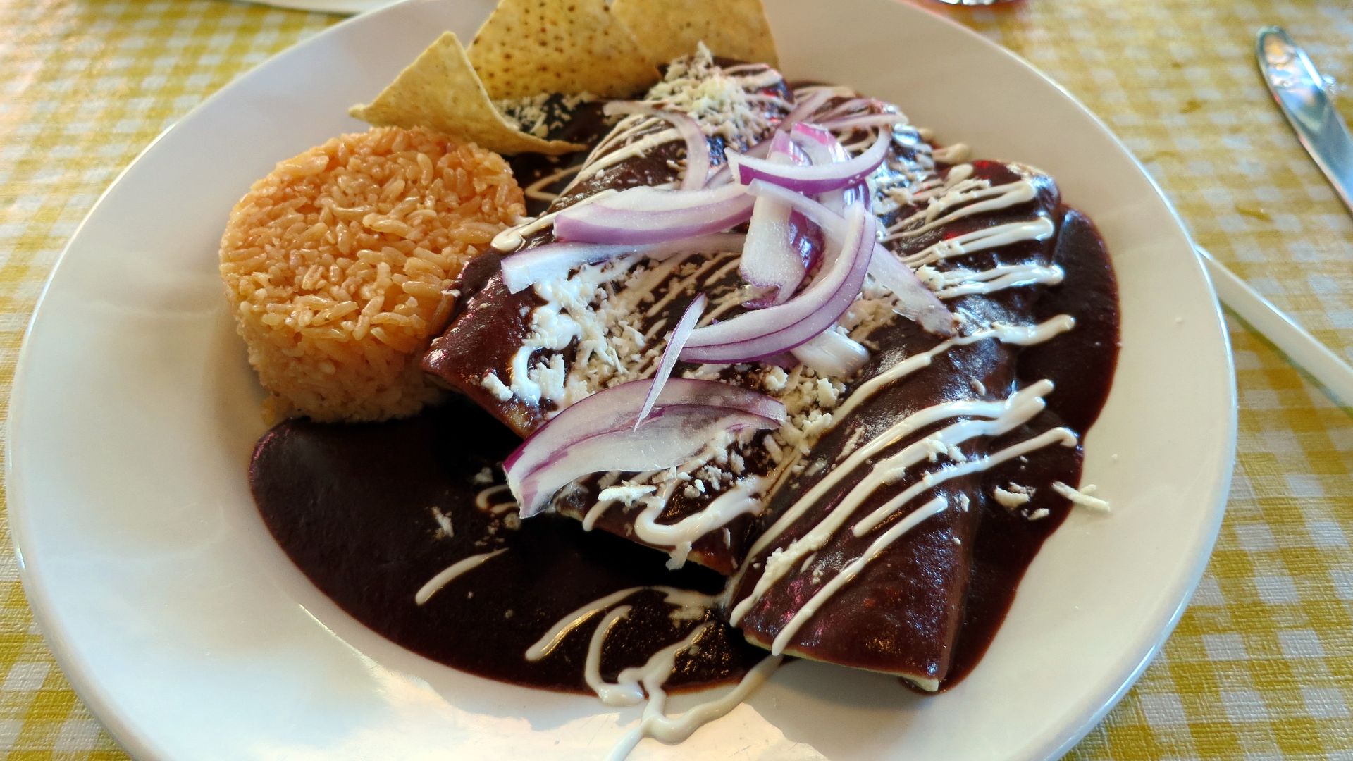 File:Enchilada with mole poblano (8071572969).jpg