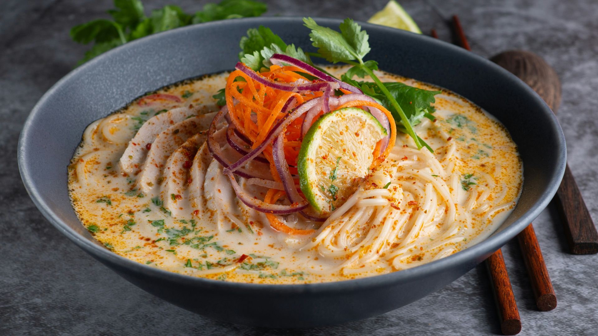 pasta dish on black ceramic plate