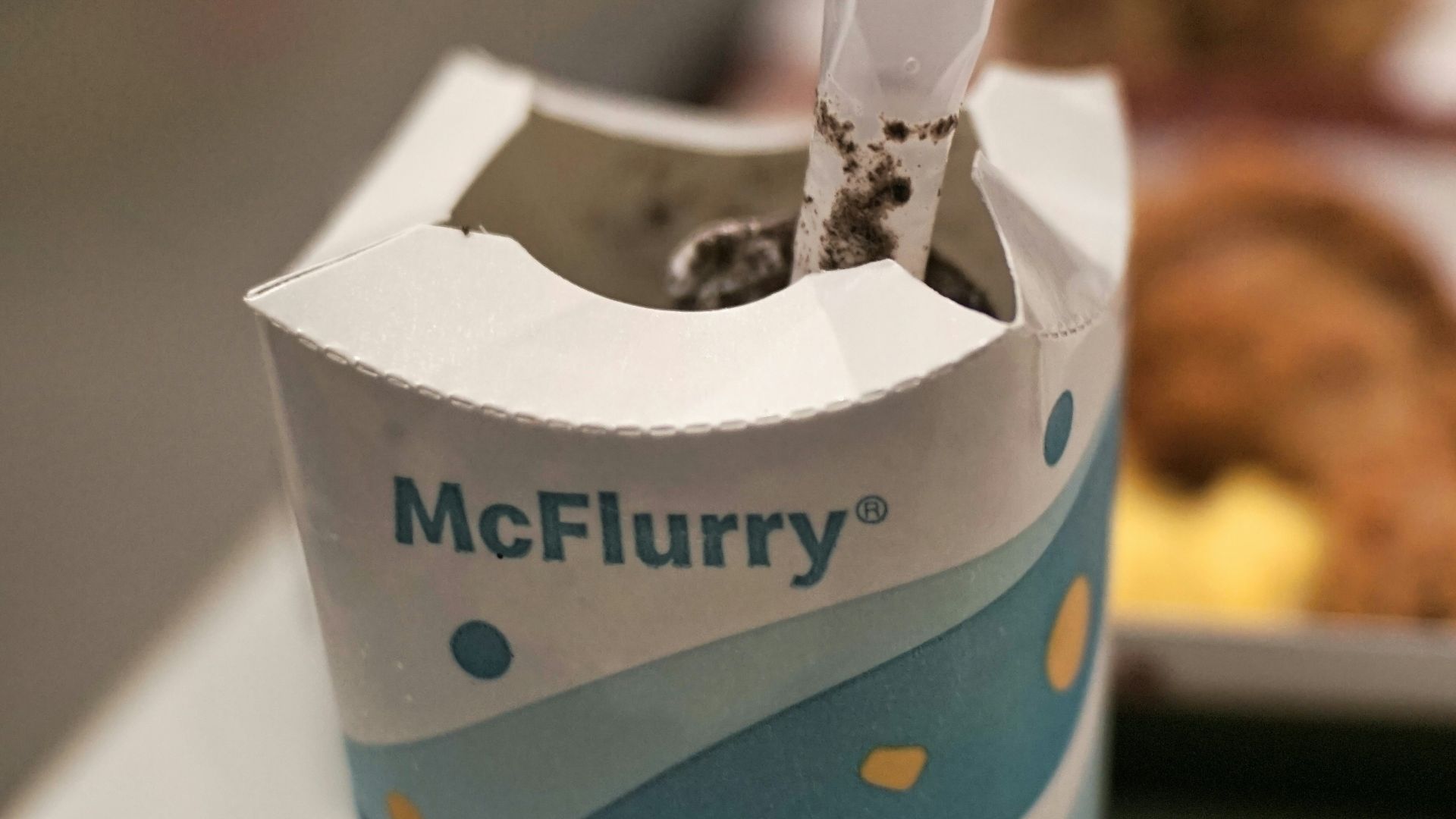 white and blue paper bag