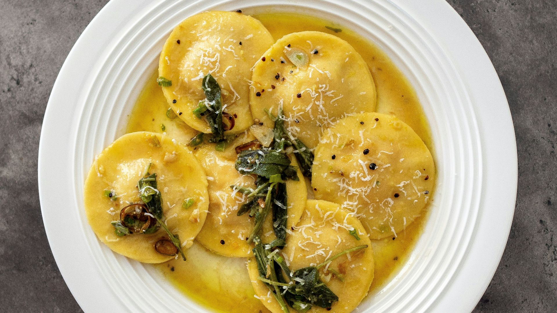 yellow fruit on white round plate