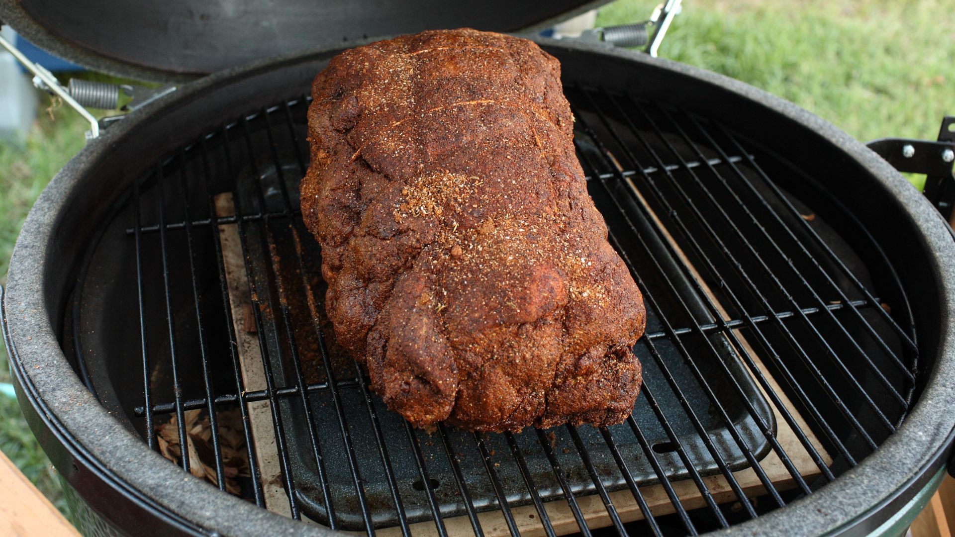File:Pork shoulder on green egg smoker.jpg