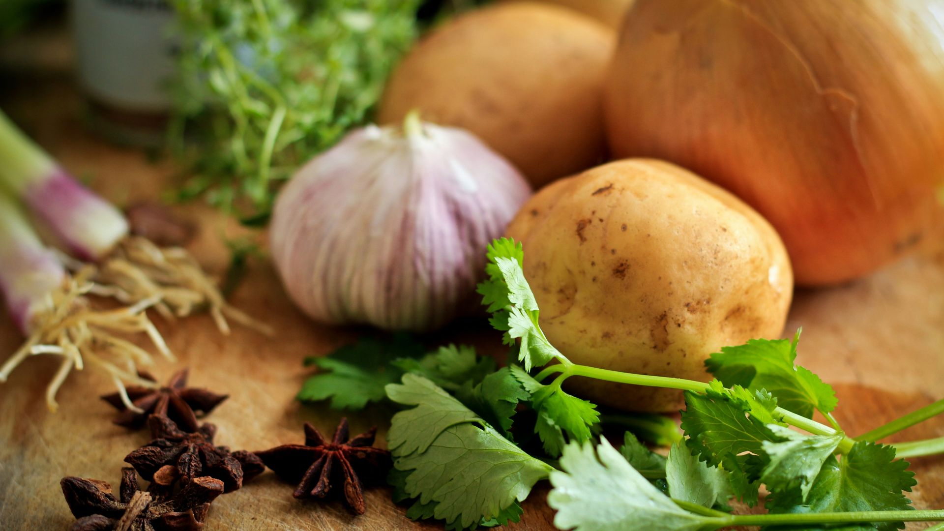 onions and potato on table