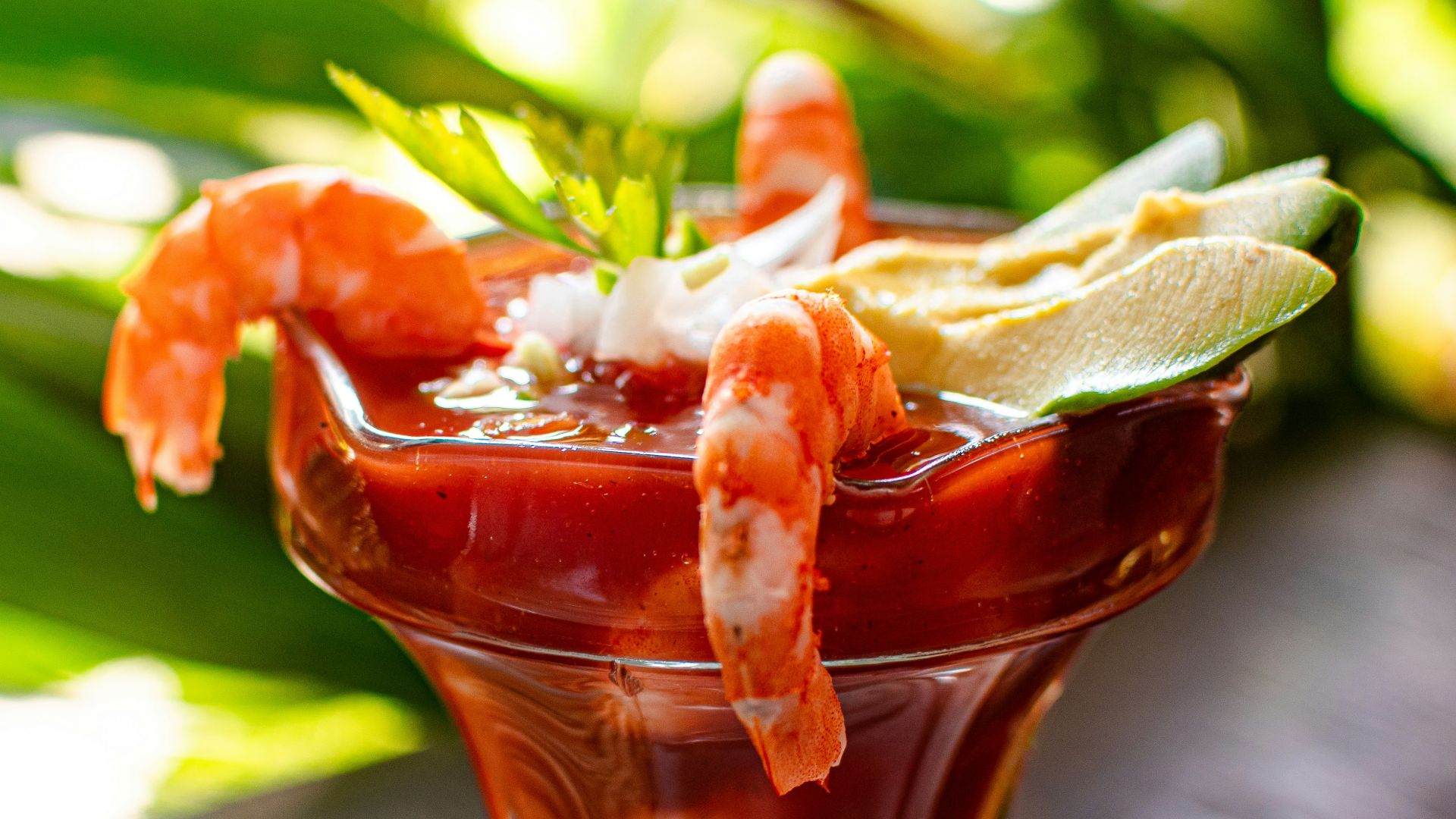 clear drinking glass with red liquid