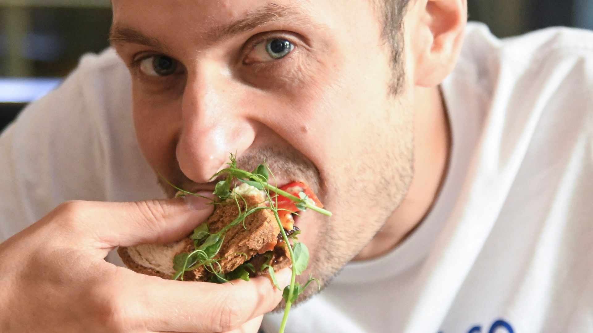 man eating a sandwich