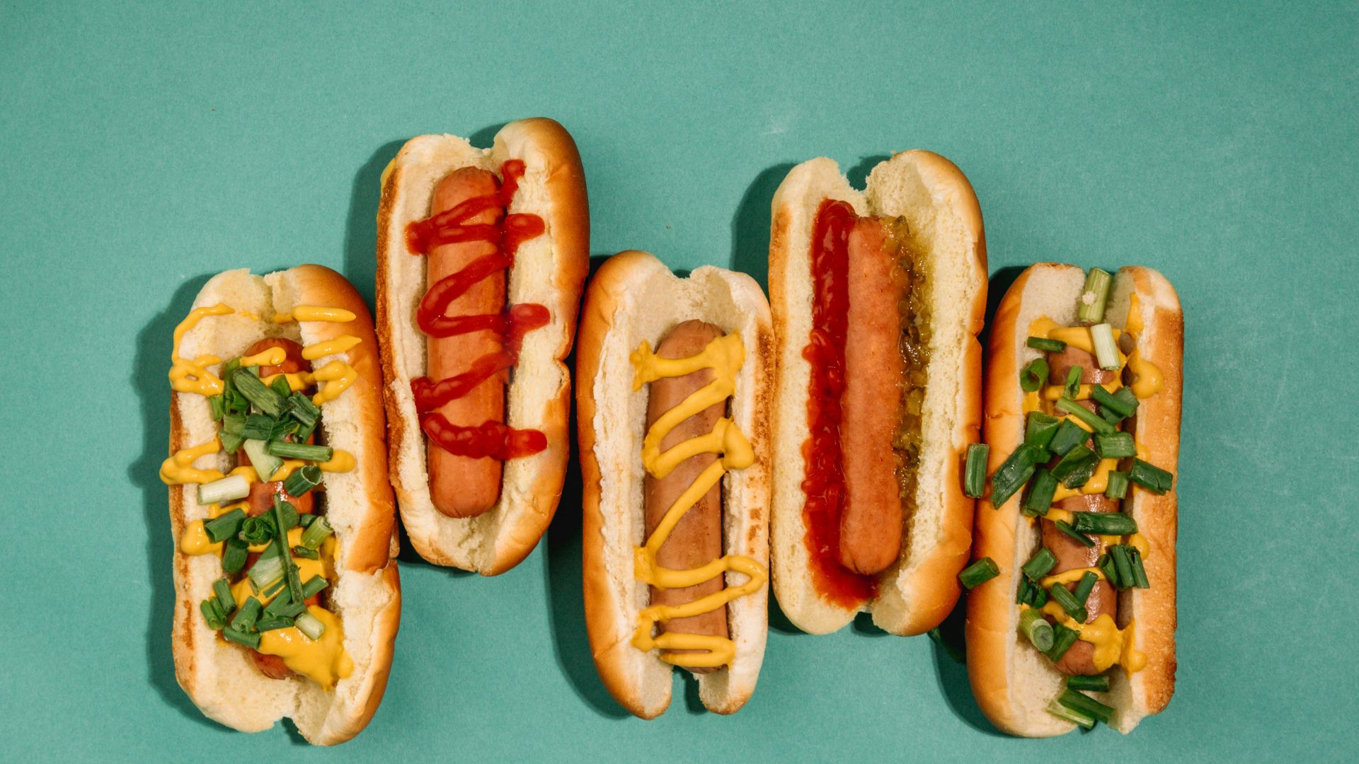 hotdog sandwich with tomato and cheese