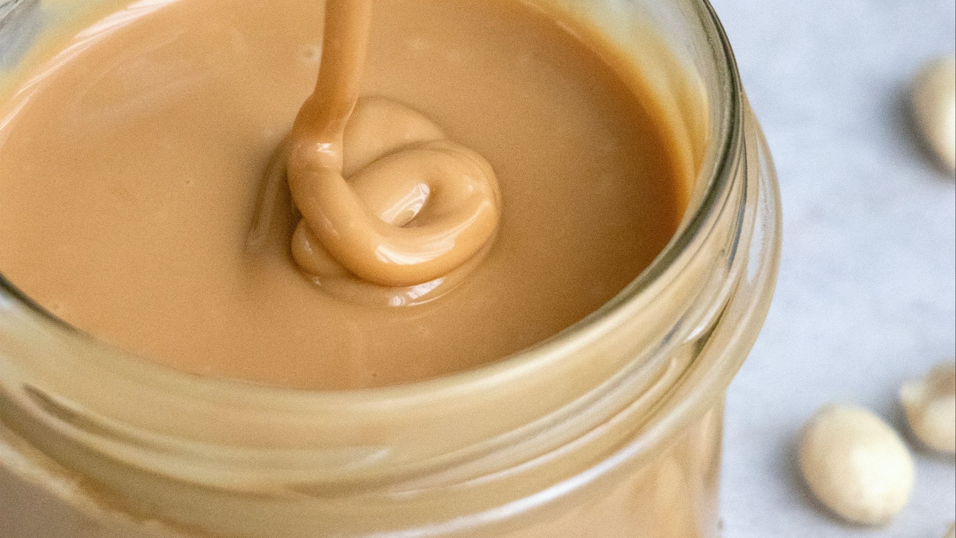clear glass jar with brown liquid