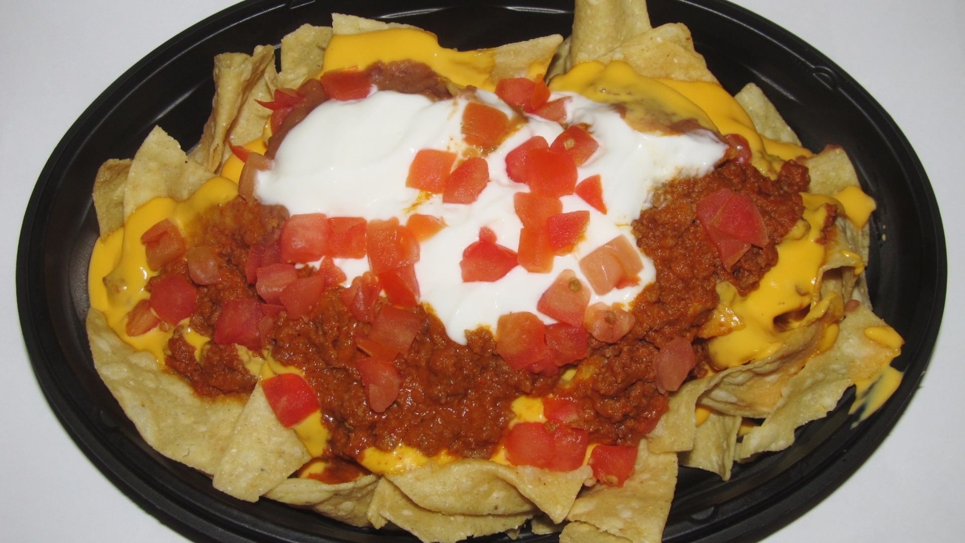 File:Taco Bell Nachos BellGrande (45756738371).jpg