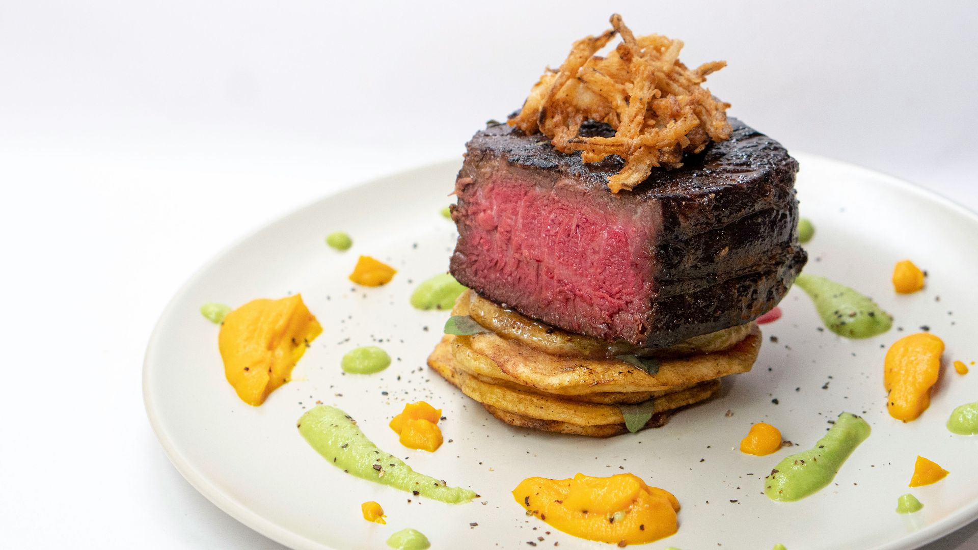 brown bread with cheese on white ceramic plate