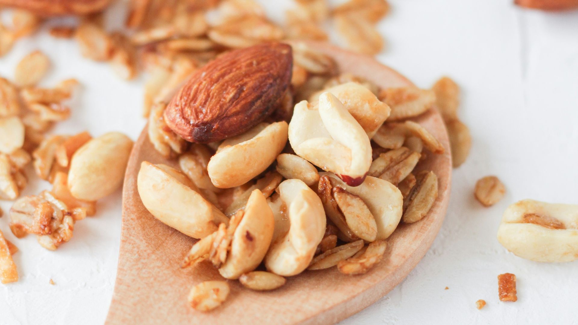 brown wooden spoon with brown and white food