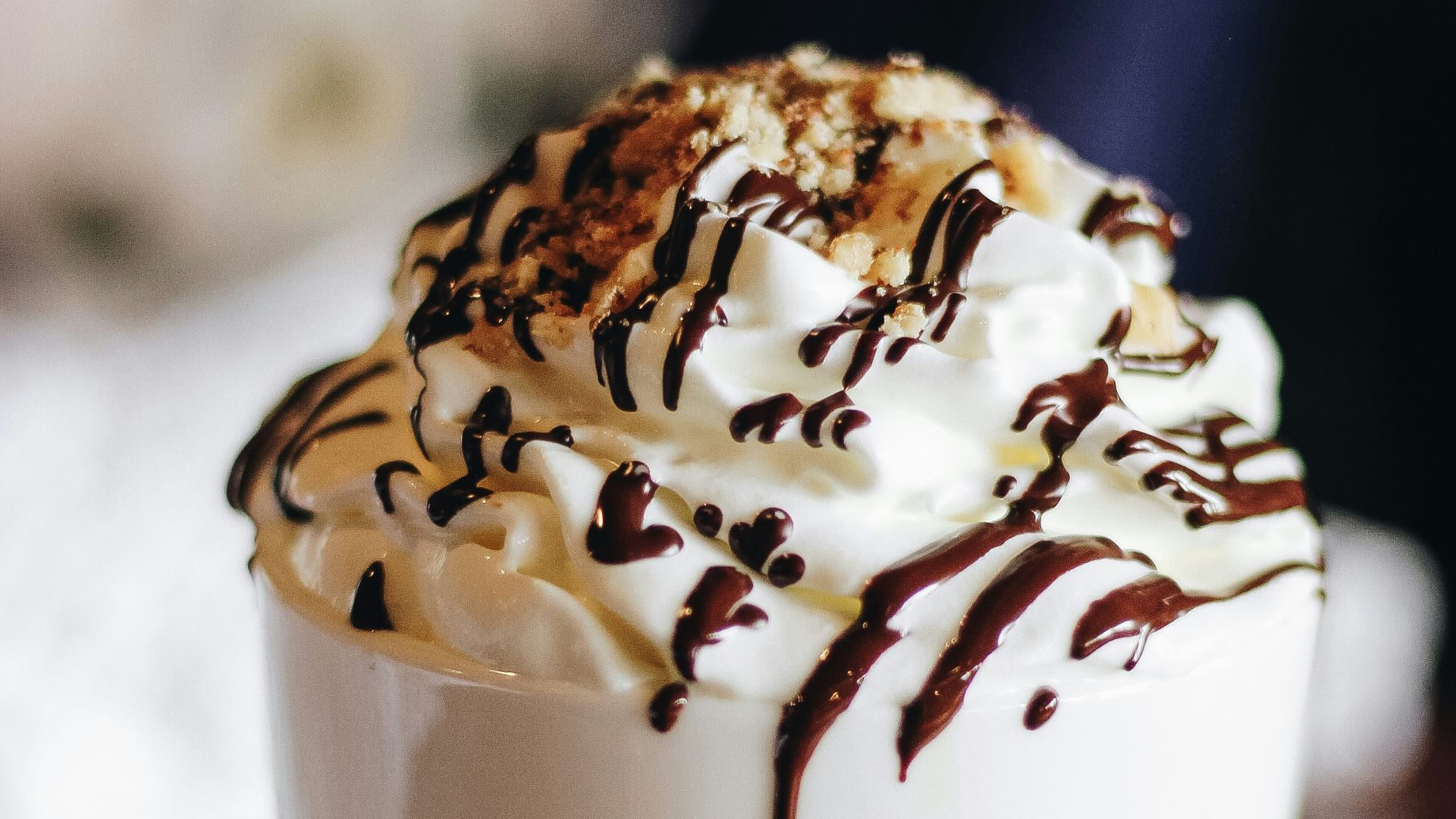 vanilla flavor ice cream with chocolate syrup