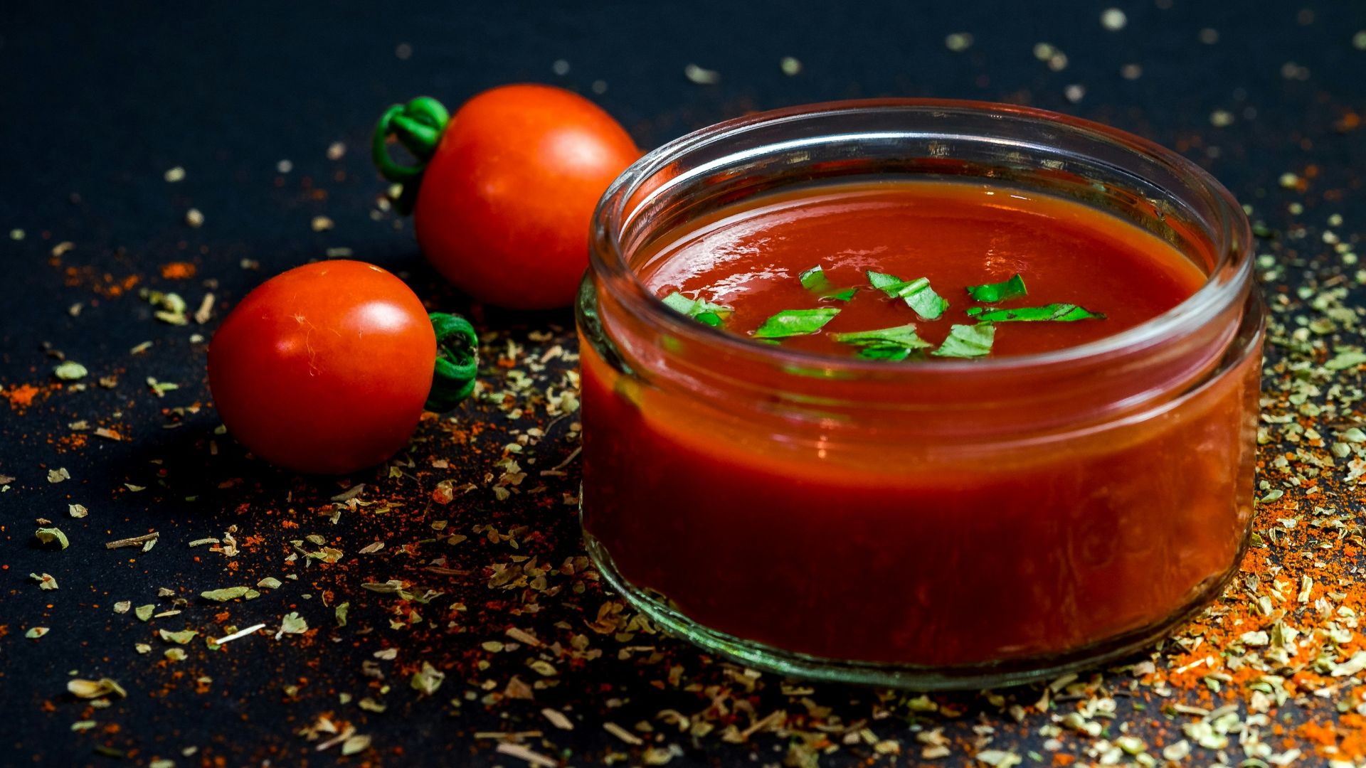tomato and tomato puree with parsley in bowl