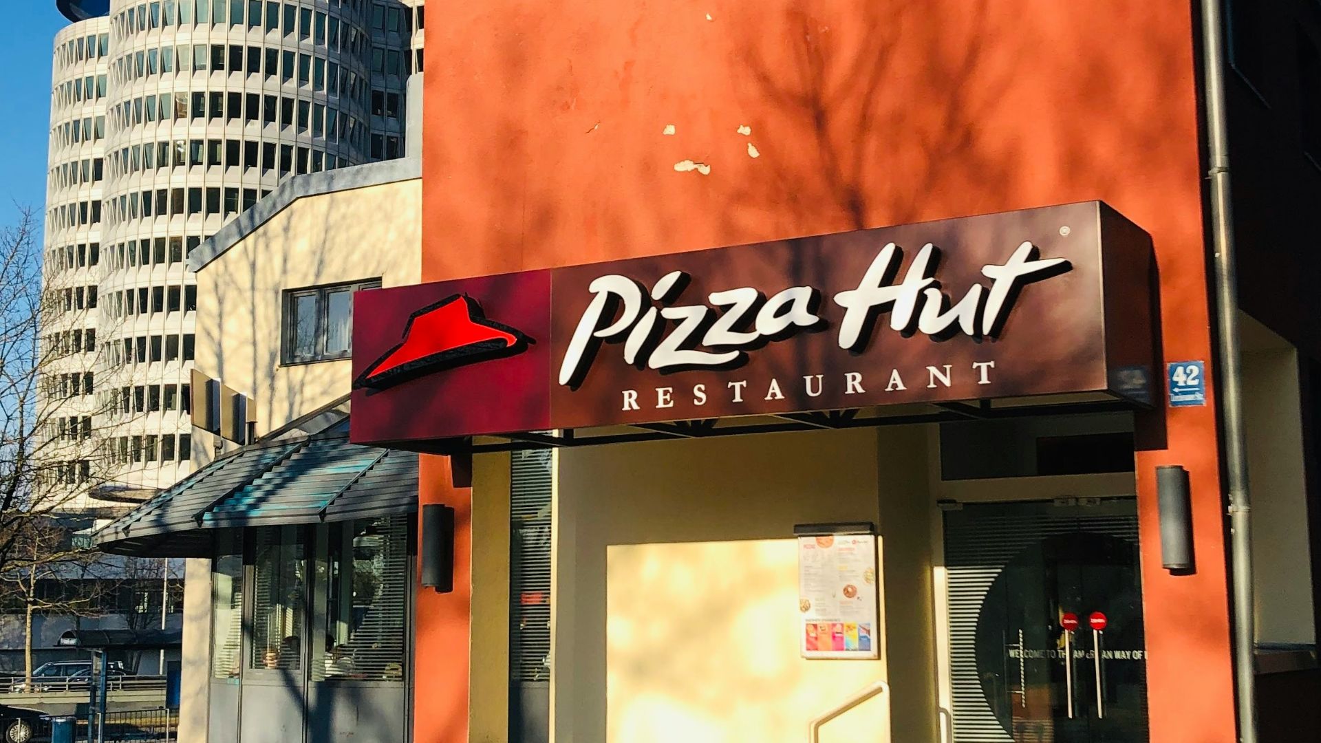 brown and white concrete building during daytime