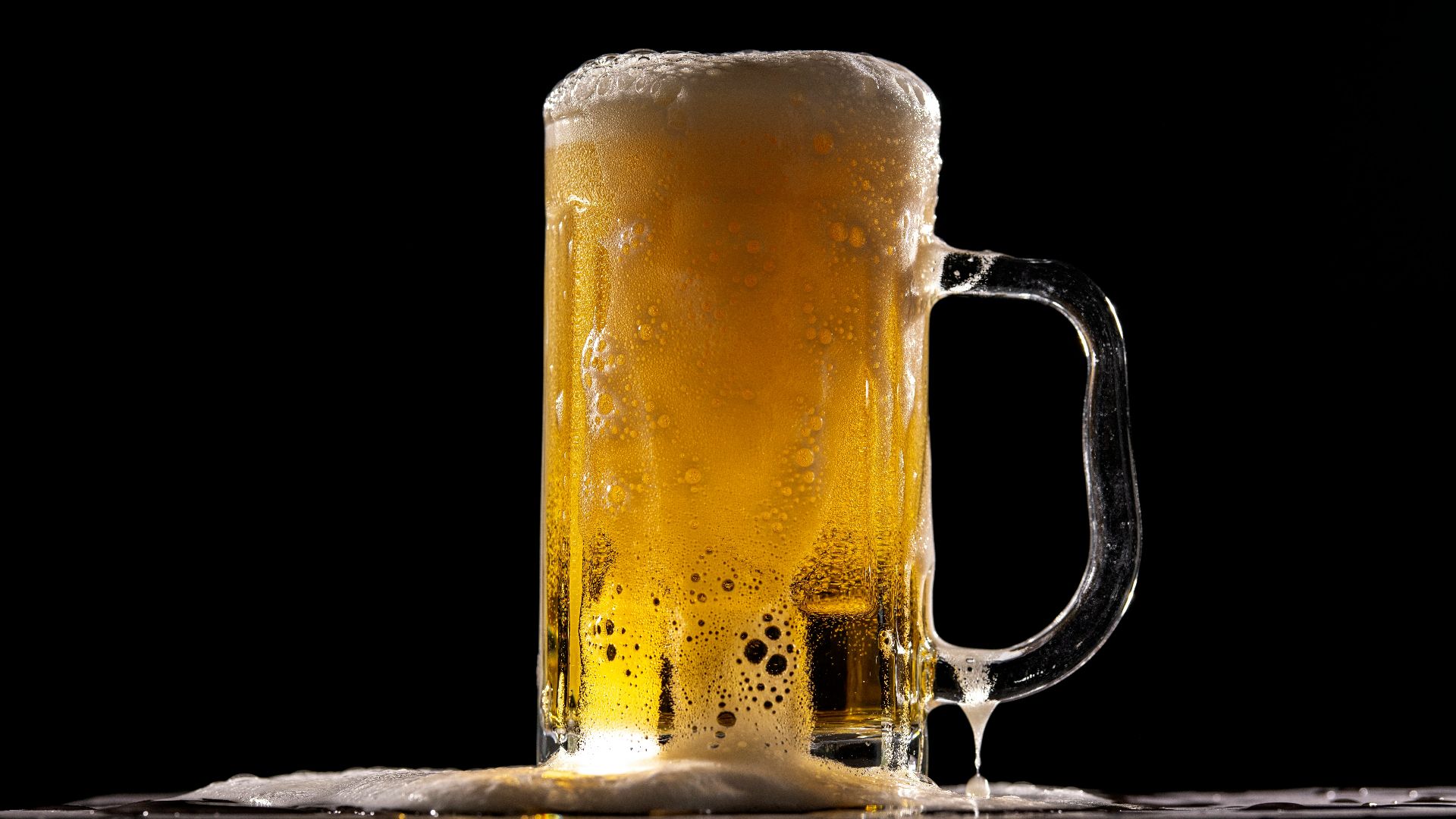 clear glass beer mug with beer