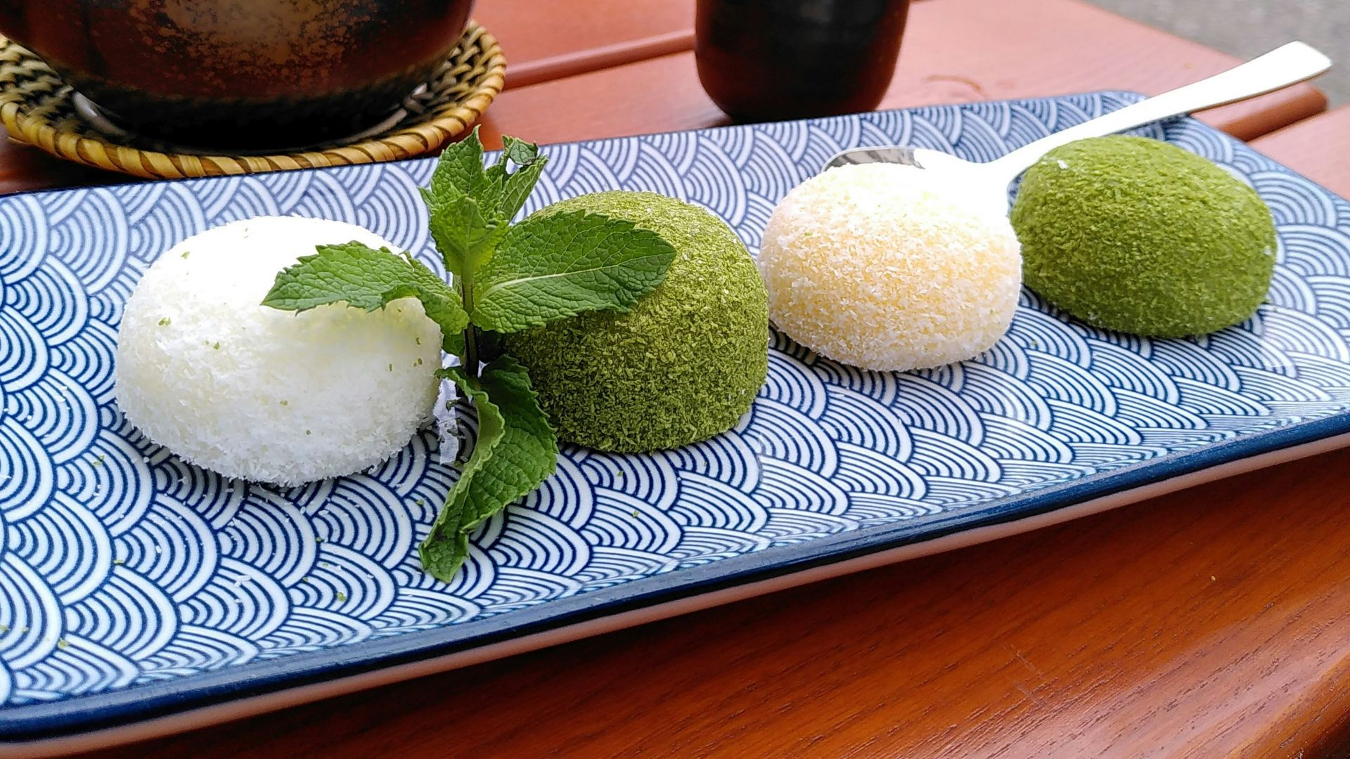 a blue plate topped with three different types of food