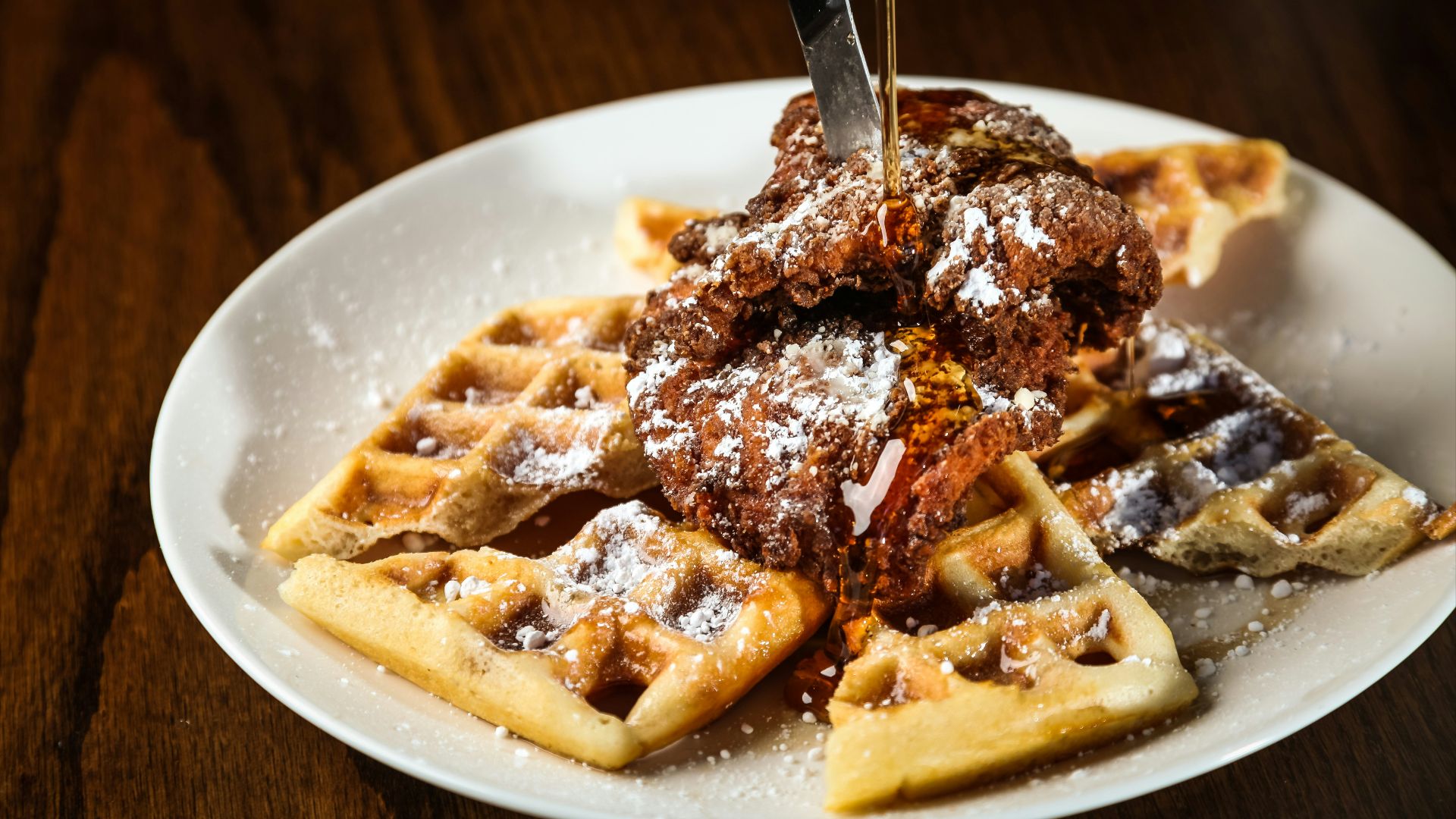 pasta with chocolate syrup on white ceramic plate