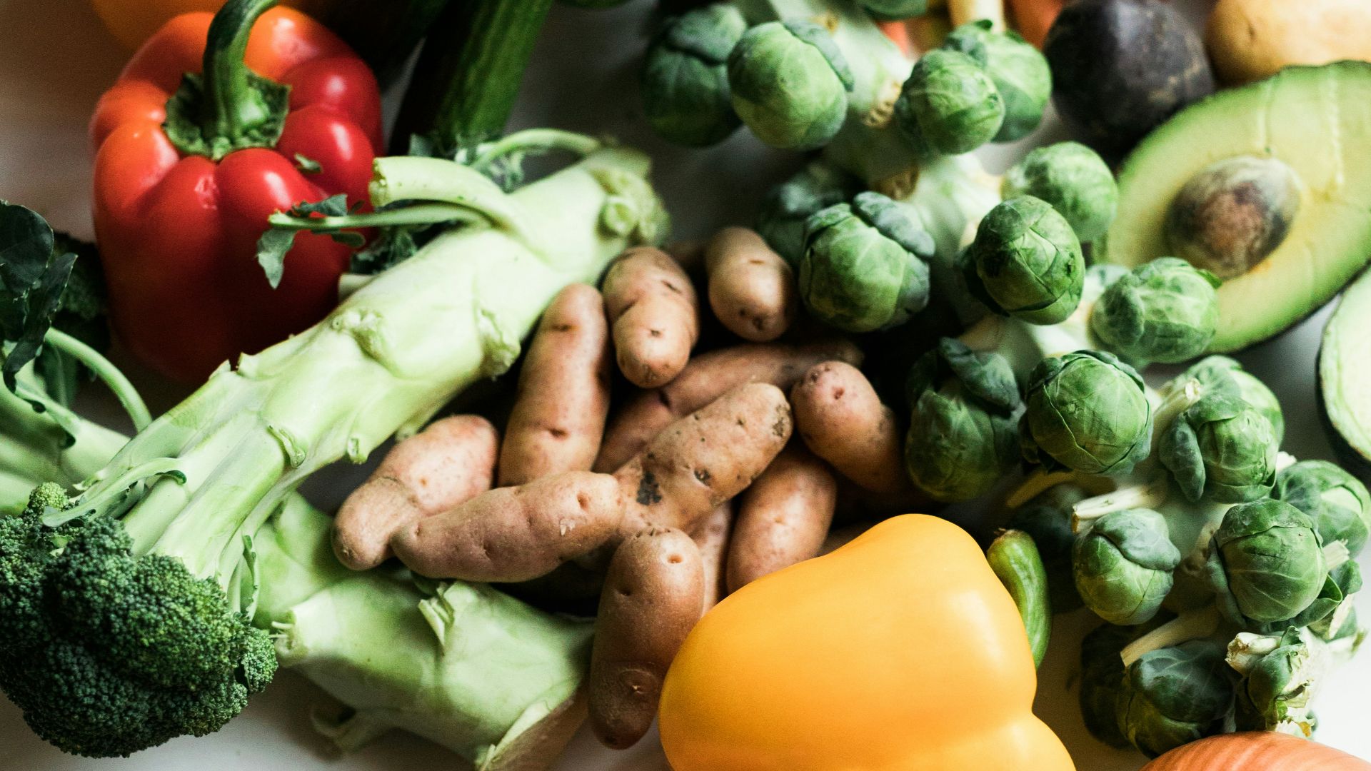 sliced carrots and green vegetable