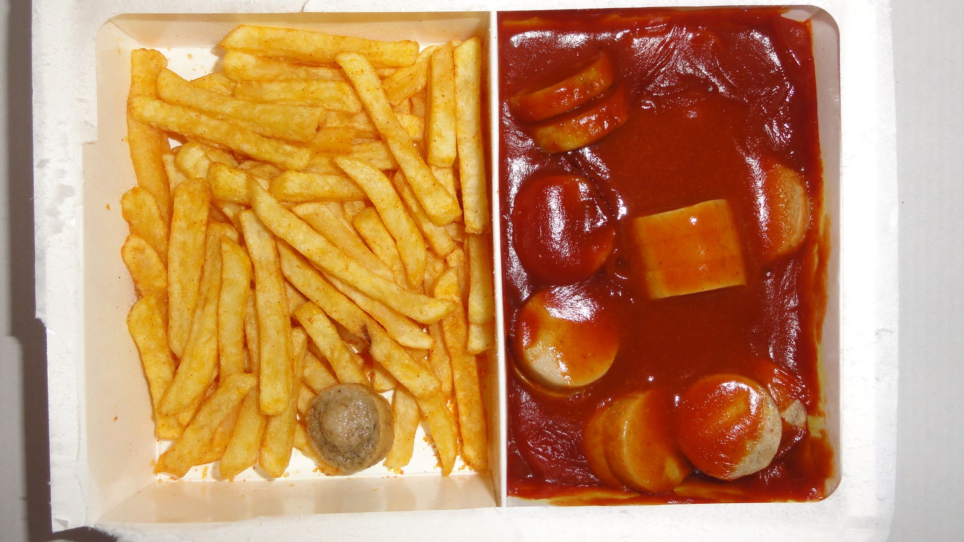 File:Ready to eat microwave food (TV dinner) Currywurst with French fries.JPG