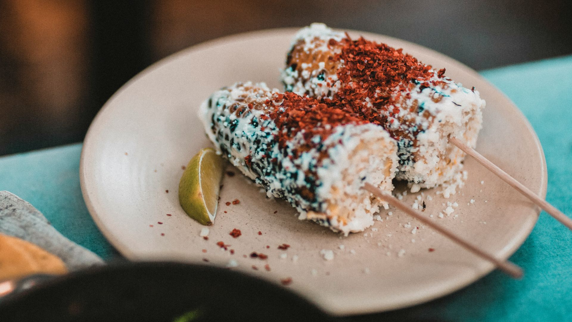 food on sticks on plate