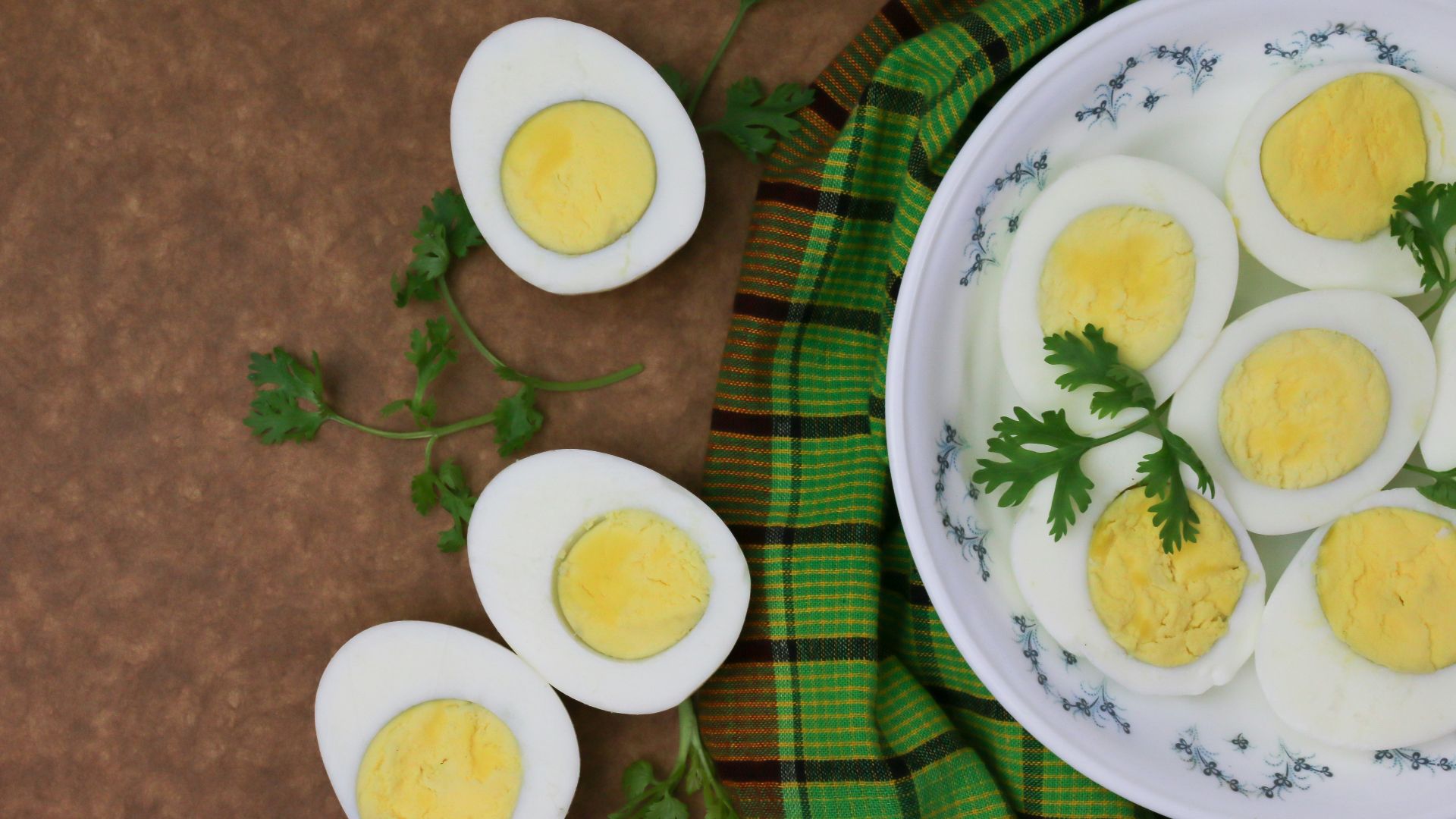 sliced lemon on white and green ceramic plate