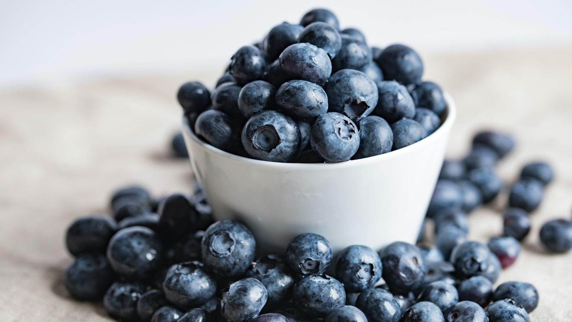 blueberries on white ceramic container