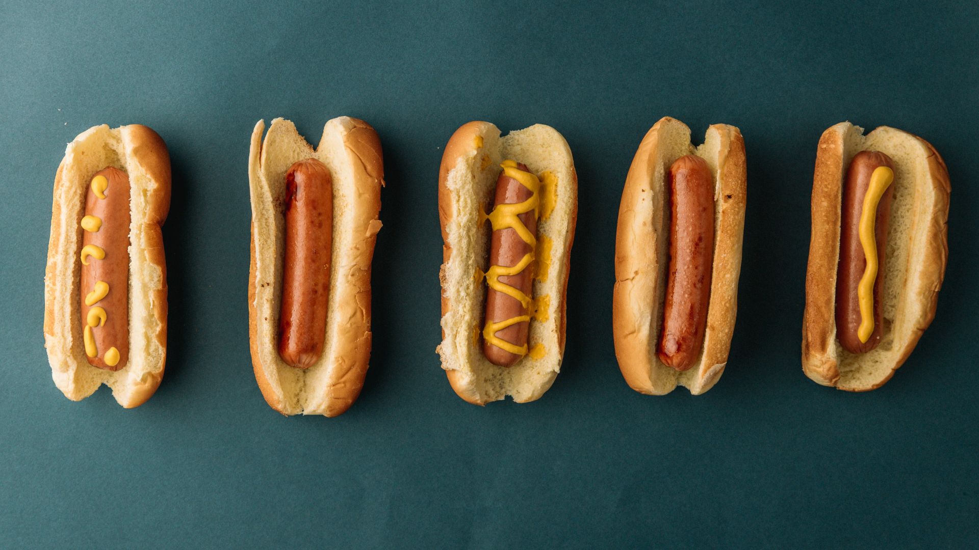 two brown bread on blue textile