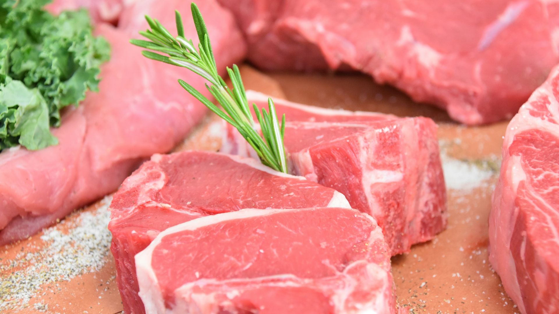 raw meat with green leaves