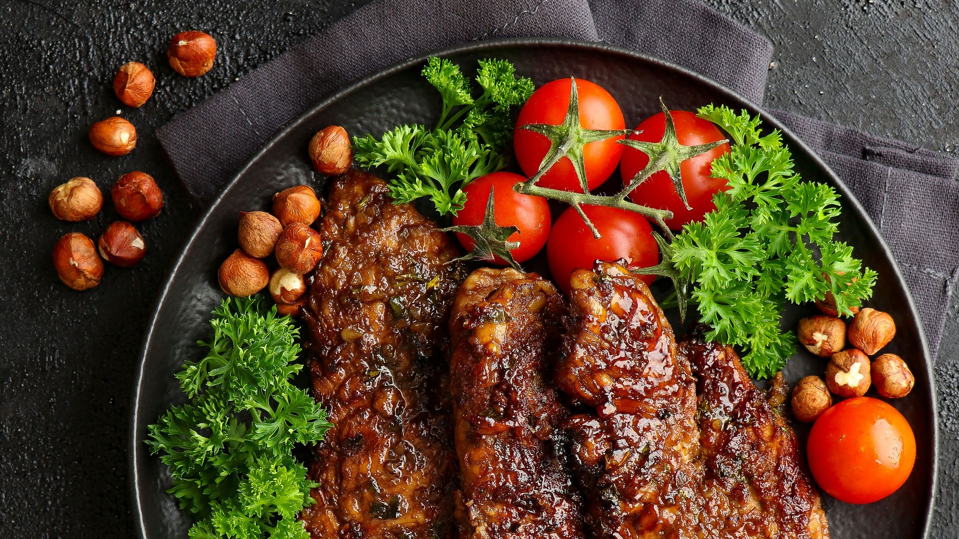 a plate of meat and vegetables on a table