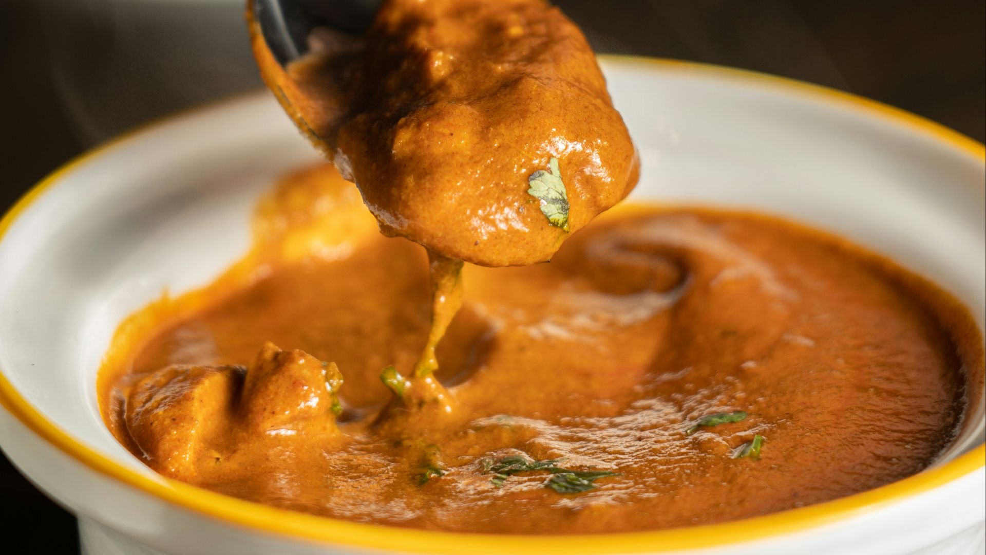 orange mushy dish in bow